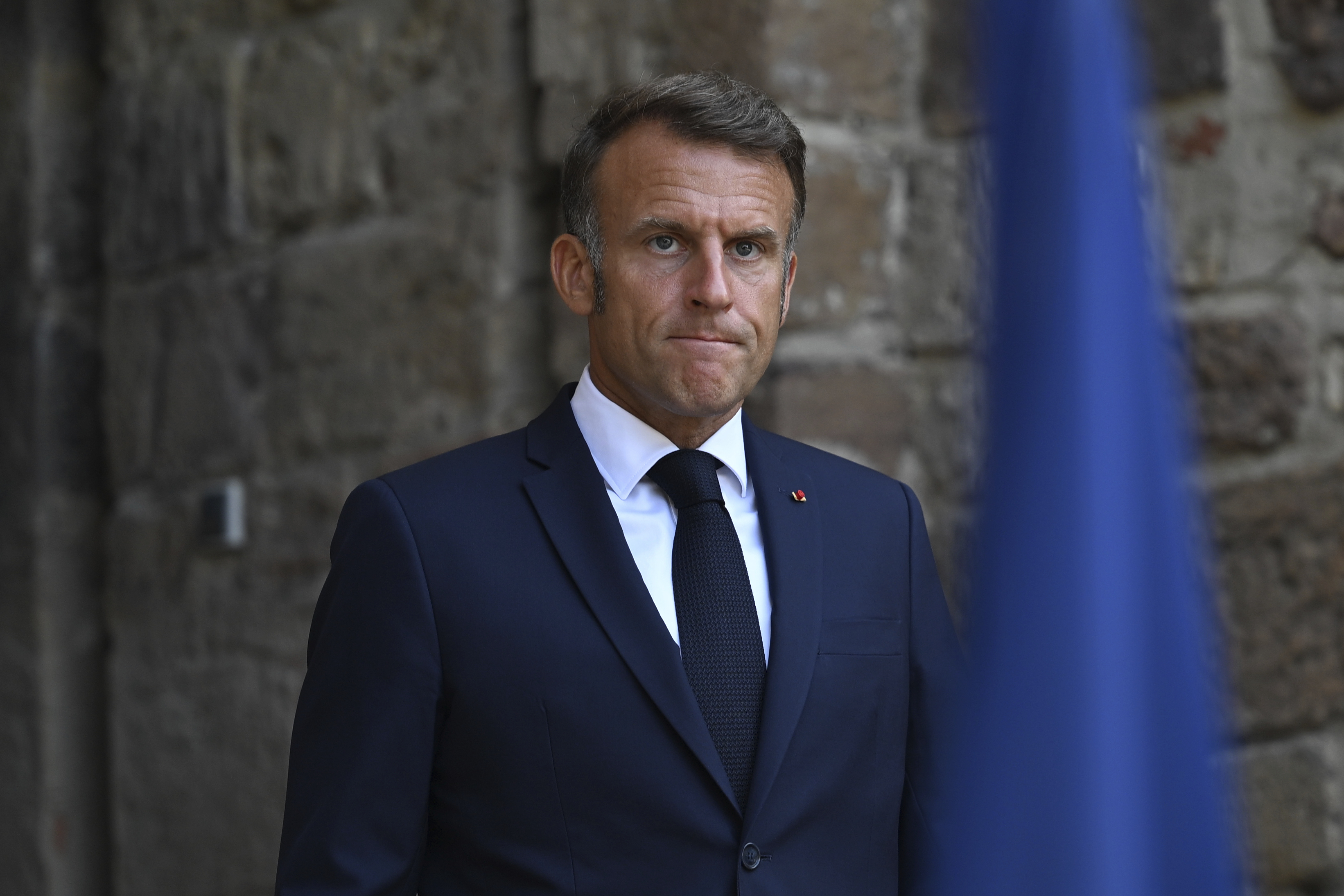 FILE - French President Emmanuel Macron arrives to speak after attending a video conference with members of the so-called 