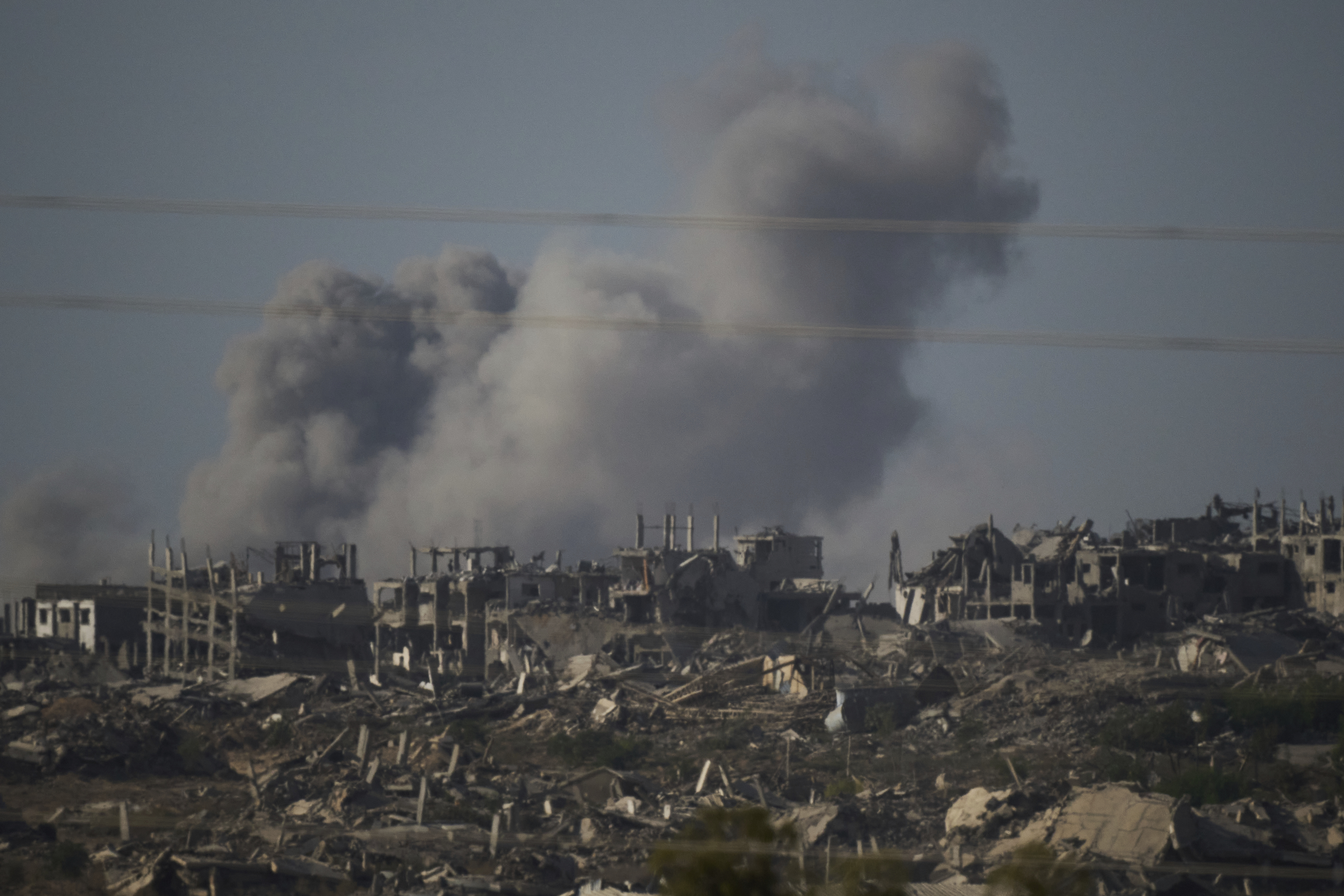Smoke rises to the sky following an Israeli military strike in the Gaza Strip, as seen from southern Israel, Tuesday, Sept. 16, 2025. (Leo Correa - AP)