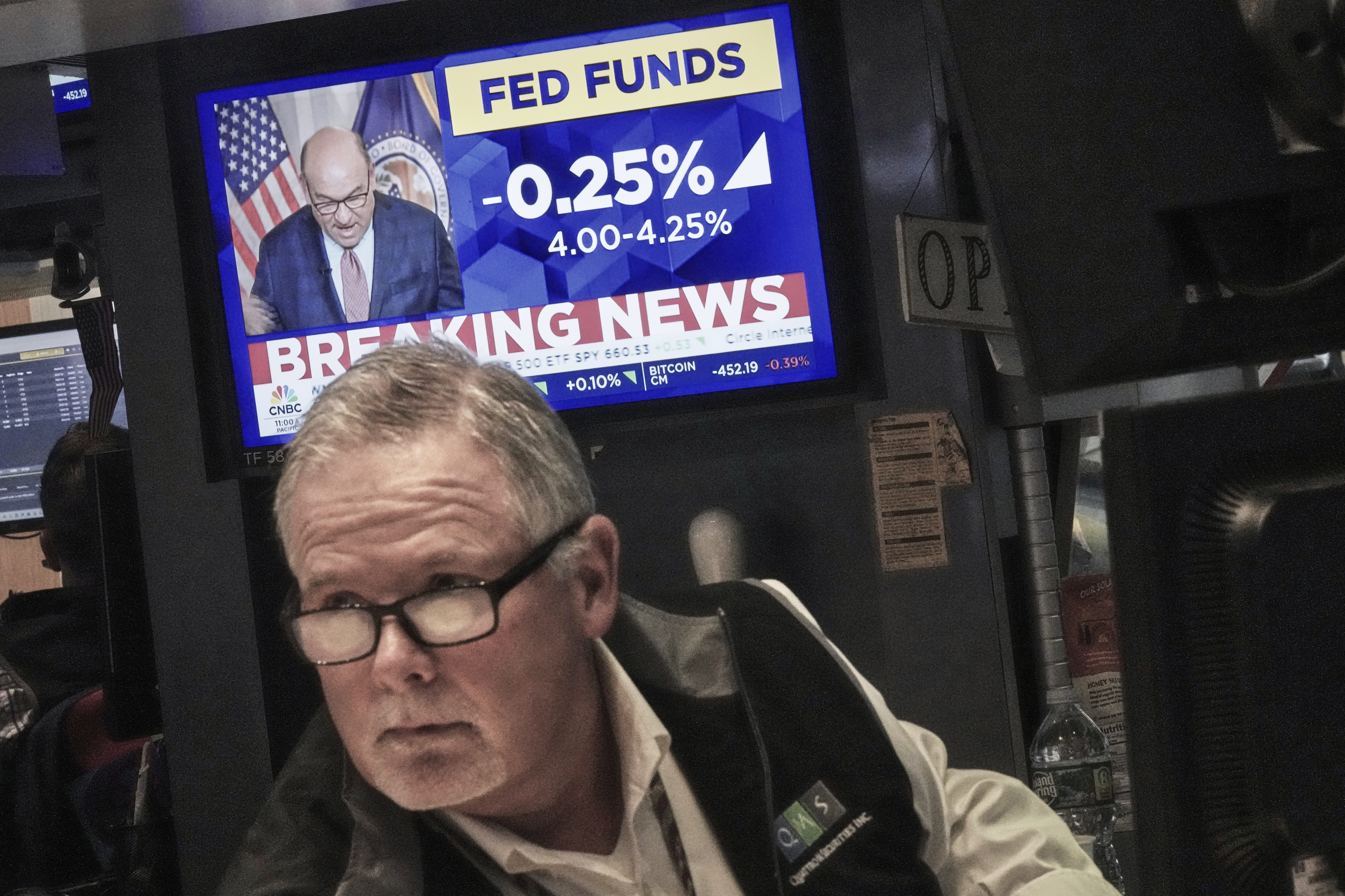 Trader Michael Conlon works on the floor of the New York Stock Exchange as the rate decision of the Federal Reserve is announced, Wednesday, Sept. 17, 2025. (Richard Drew - AP)