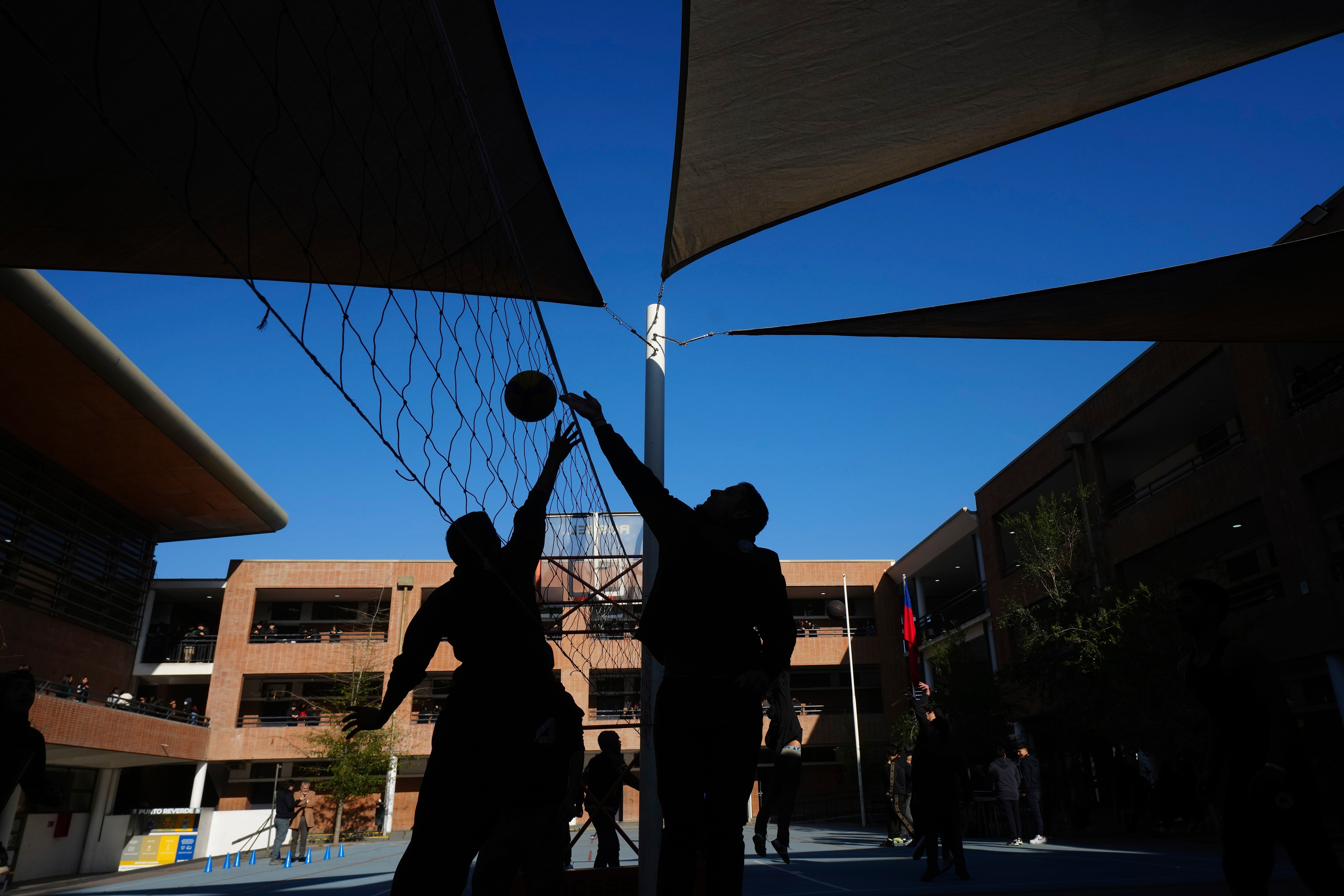 Students play volleyball at the Bicentenario School in Santiago, Chile, Monday, Sept. 8, 2025. (Esteban Felix - AP)