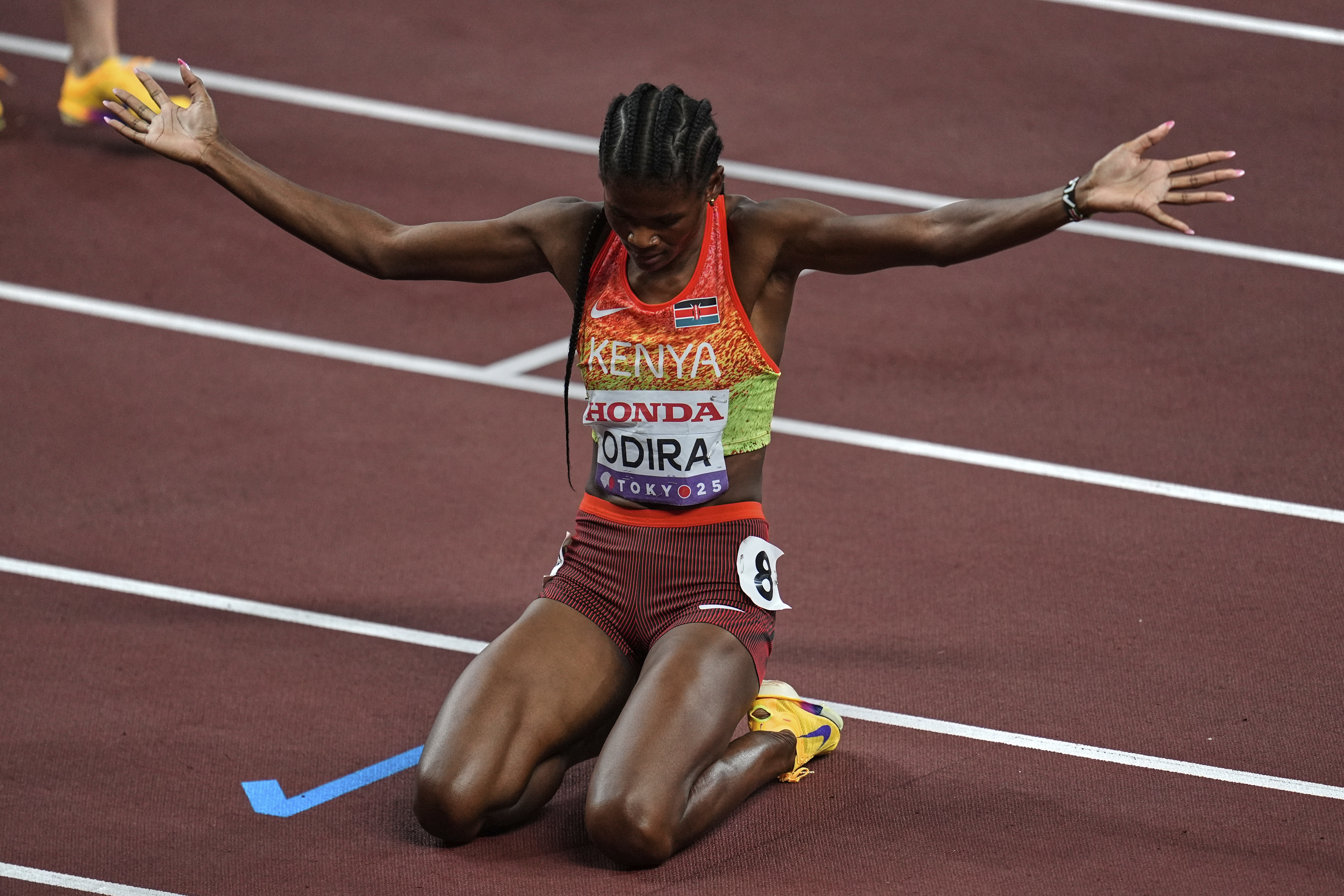 Kenya's Lilian Odira celebrates after winning the women's 800 meters final at the World Athletics Championships in Tokyo, Sunday, Sept. 21, 2025. (Abbie Parr - AP)