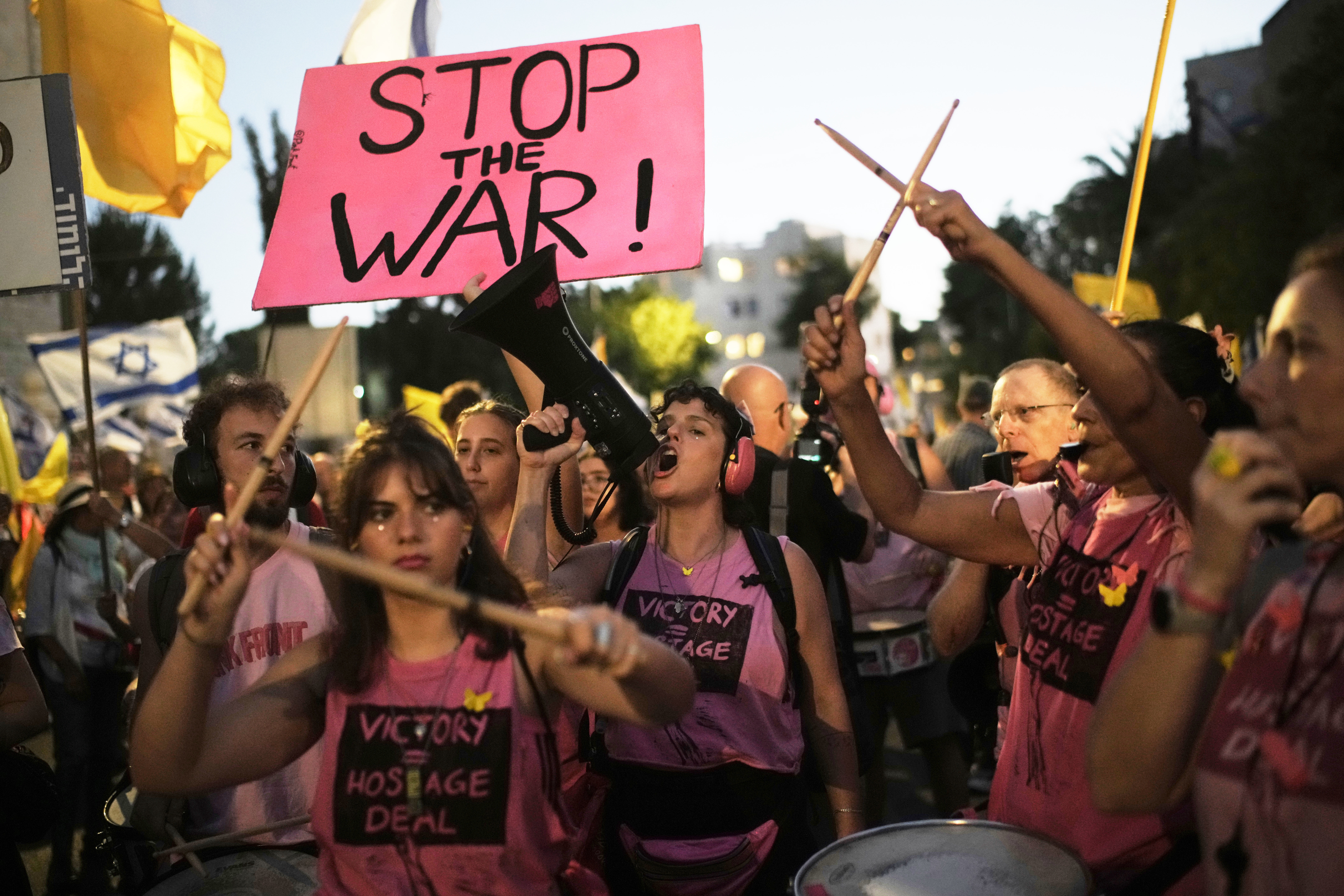 FILE - People take part in a protest demanding the immediate release of all hostages held by Hamas and calling for the end to the war in Gaza, in Jerusalem, Wednesday, Sept. 3, 2025. (Leo Correa - AP)