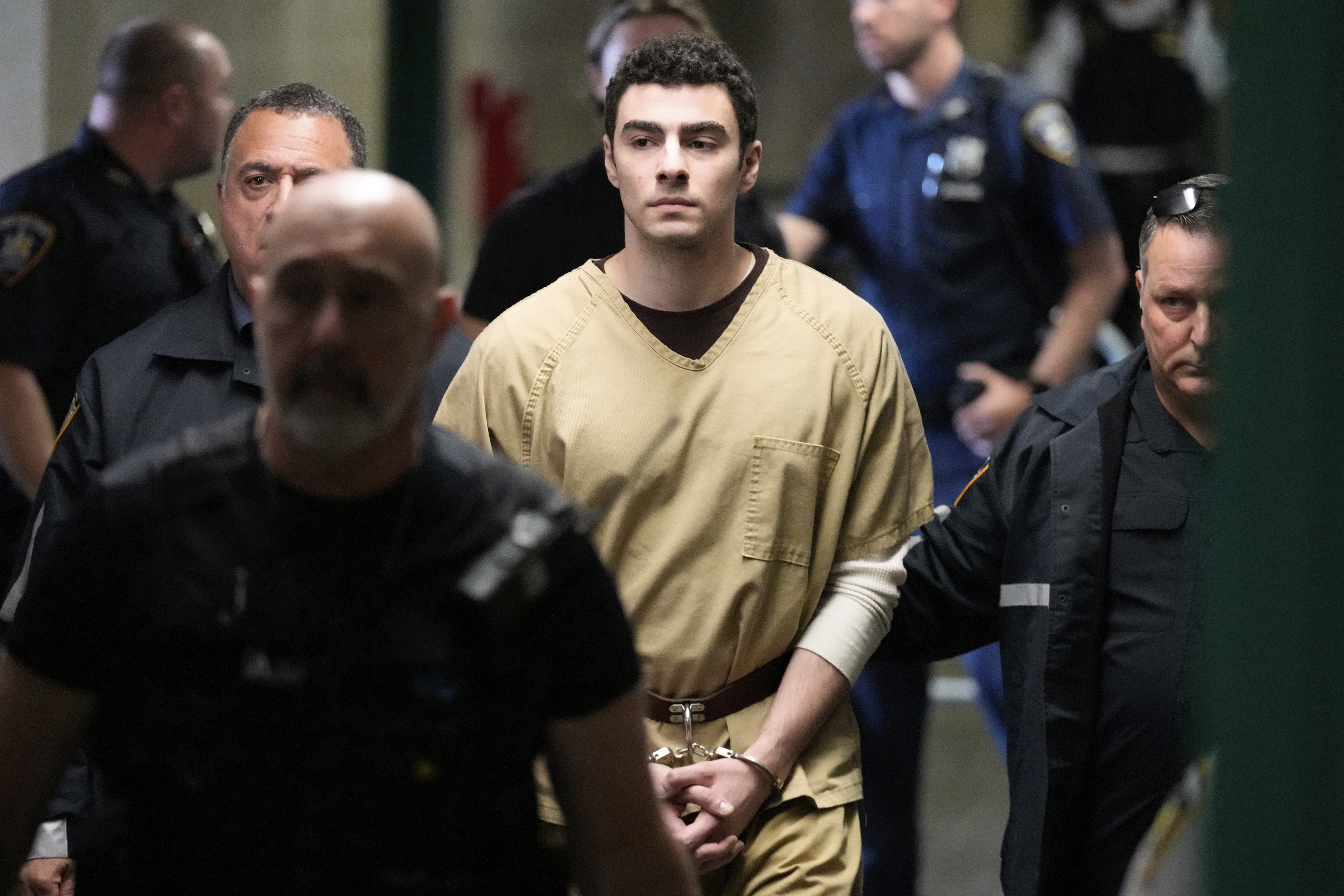 Luigi Mangione is escorted into Manhattan state court in New York, Tuesday, Sept. 16, 2025. (Seth Wenig - AP)