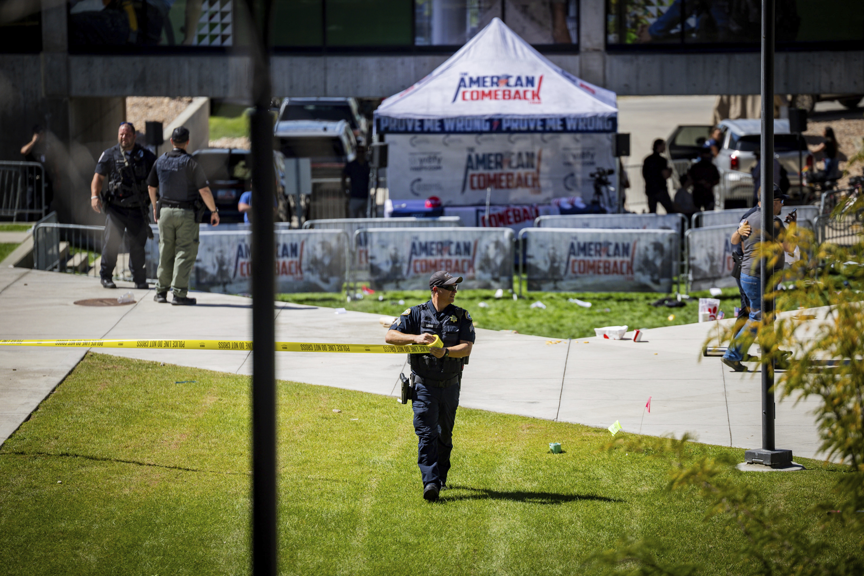 CORRECTS PHOTOGRAPHER LAST NAME FROM CROEWLEY TO CROWLEY - Law enforcement tapes off an area after Charlie Kirk, the CEO and co-founder of the conservative youth organization Turning Point USA, was shot at Utah Valley University, Wednesday, Sept. 10, 2025, in Orem, Utah. (Tess Crowley - The Deseret News)