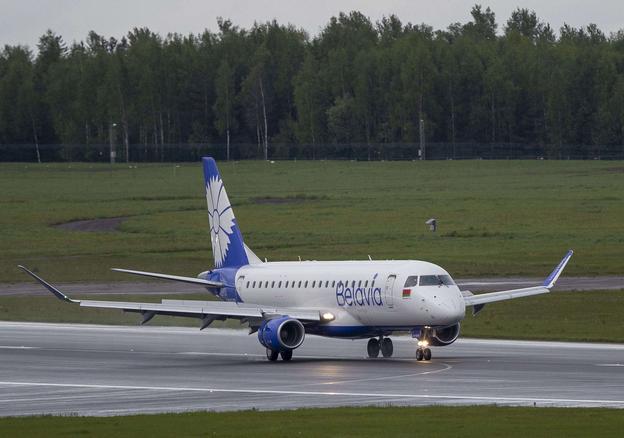 FILE - A Belavia plane of Belarus national carrier, lands at the International Airport outside Vilnius, Lithuania on Sunday, May 23, 2021. (Mindaugas Kulbis - AP)