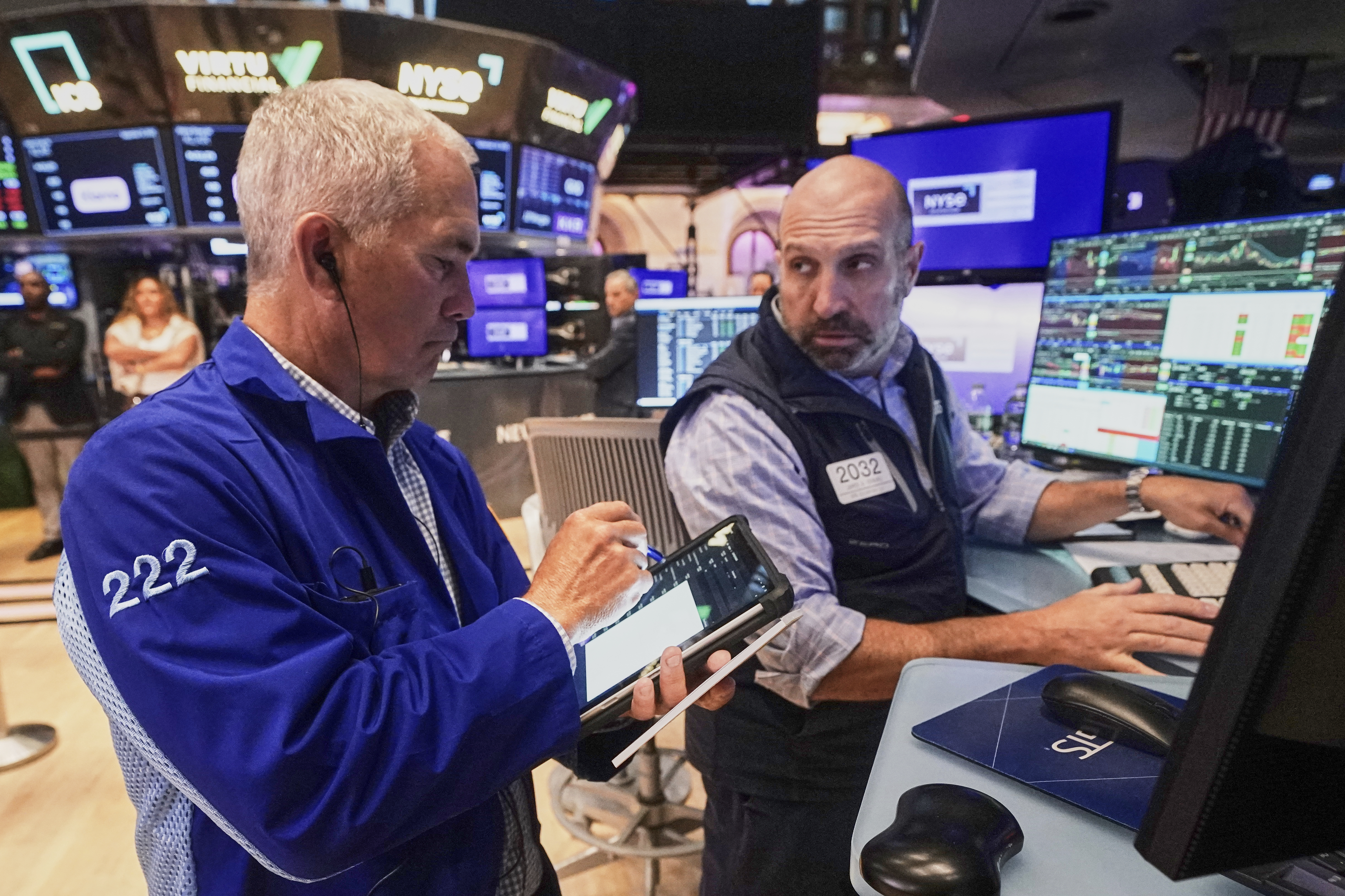 Trader Timothy Nick, left, and specialist James Denaro work on the floor of the New York Stock Exchange, Wednesday, Sept. 10, 2025. (Richard Drew - AP)