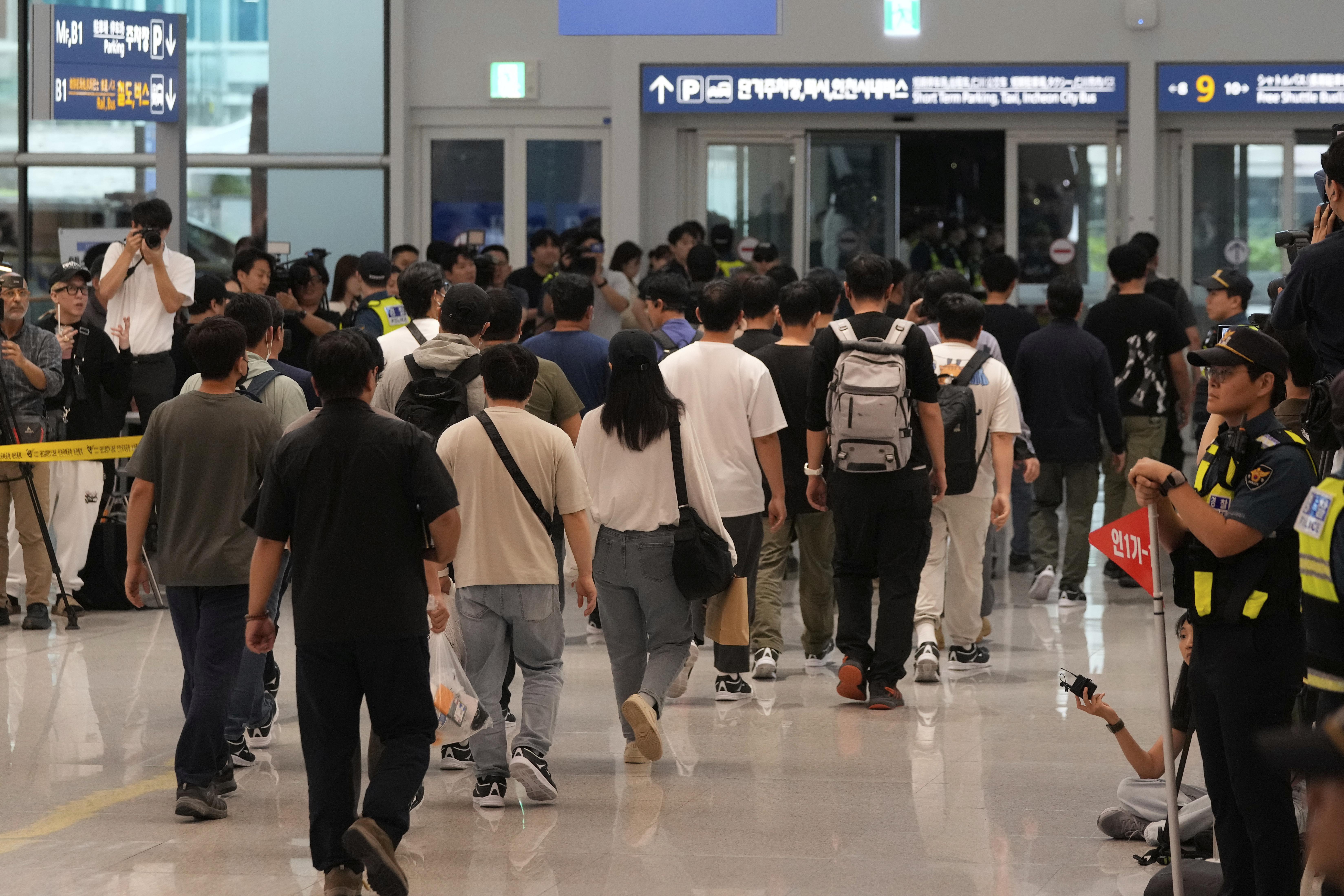 South Korean workers released after days of detention in Georgia arrive at the Incheon International Airport, in Incheon, South Korea, Friday, Sept. 12, 2025. (Ahn Young-joon - AP)