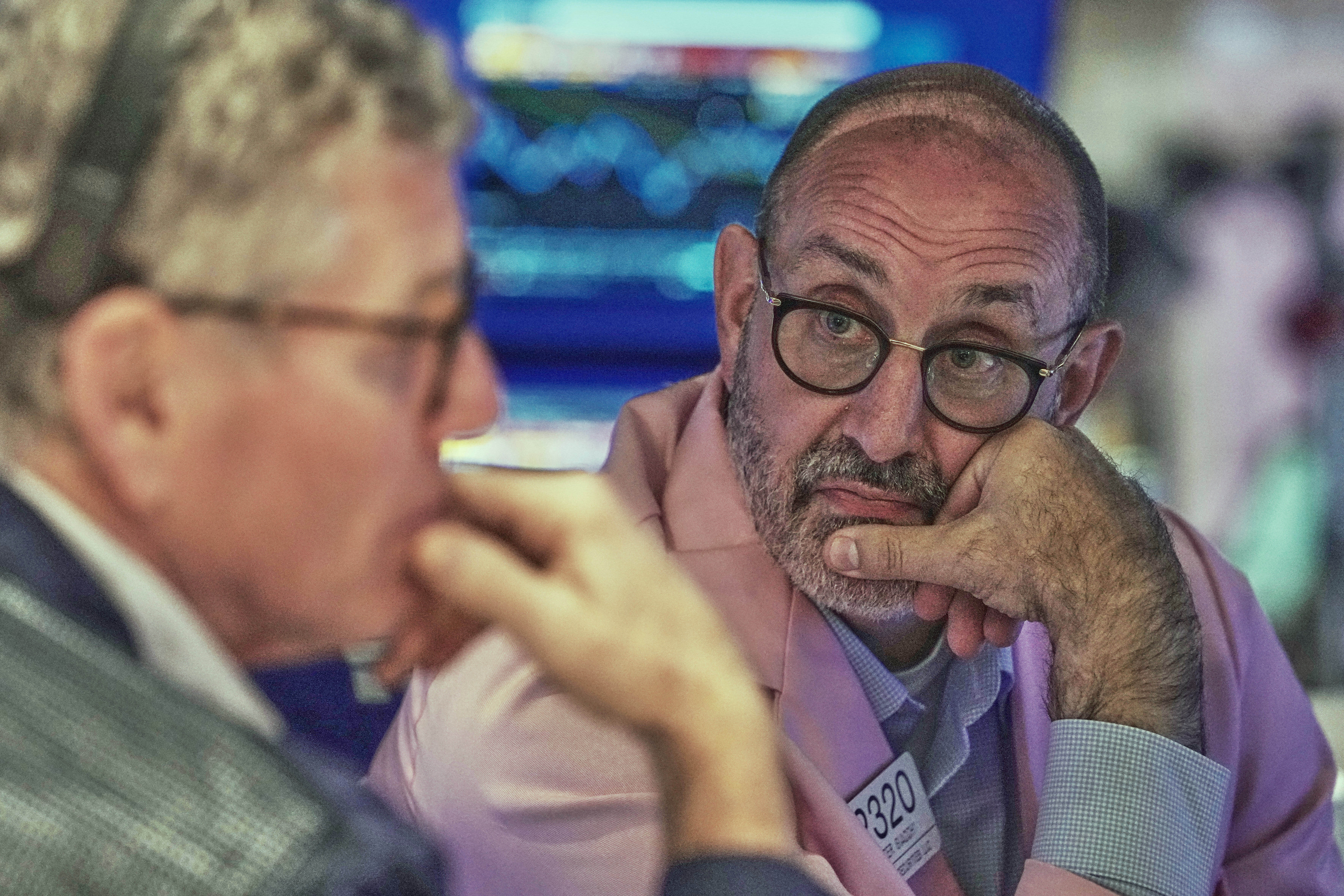 Trader Sean Spain, left, and specialist Peter Giacchi work on the floor of the New York Stock Exchange, Wednesday, Sept. 10, 2025. (Richard Drew - AP)
