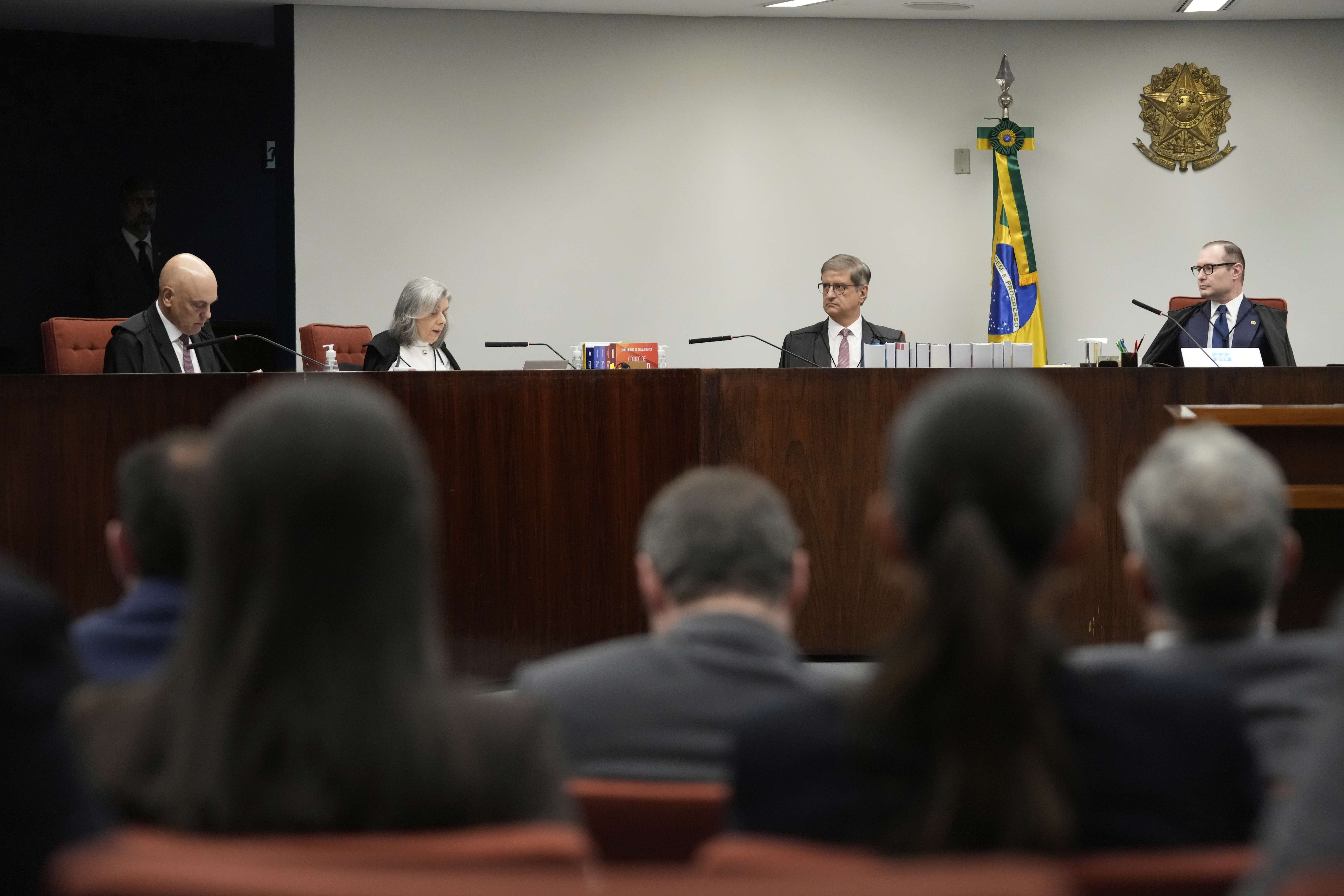 Justices of the Brazilian Supreme Court meet for the verdict and sentencing phase of a trial for those charged in an alleged coup plot to keep Brazil's former President Jair Bolsonaro in office after his 2022 election defeat, in Brasilia, Brazil, Thursday, Sept. 11, 2025. (Eraldo Peres - AP)