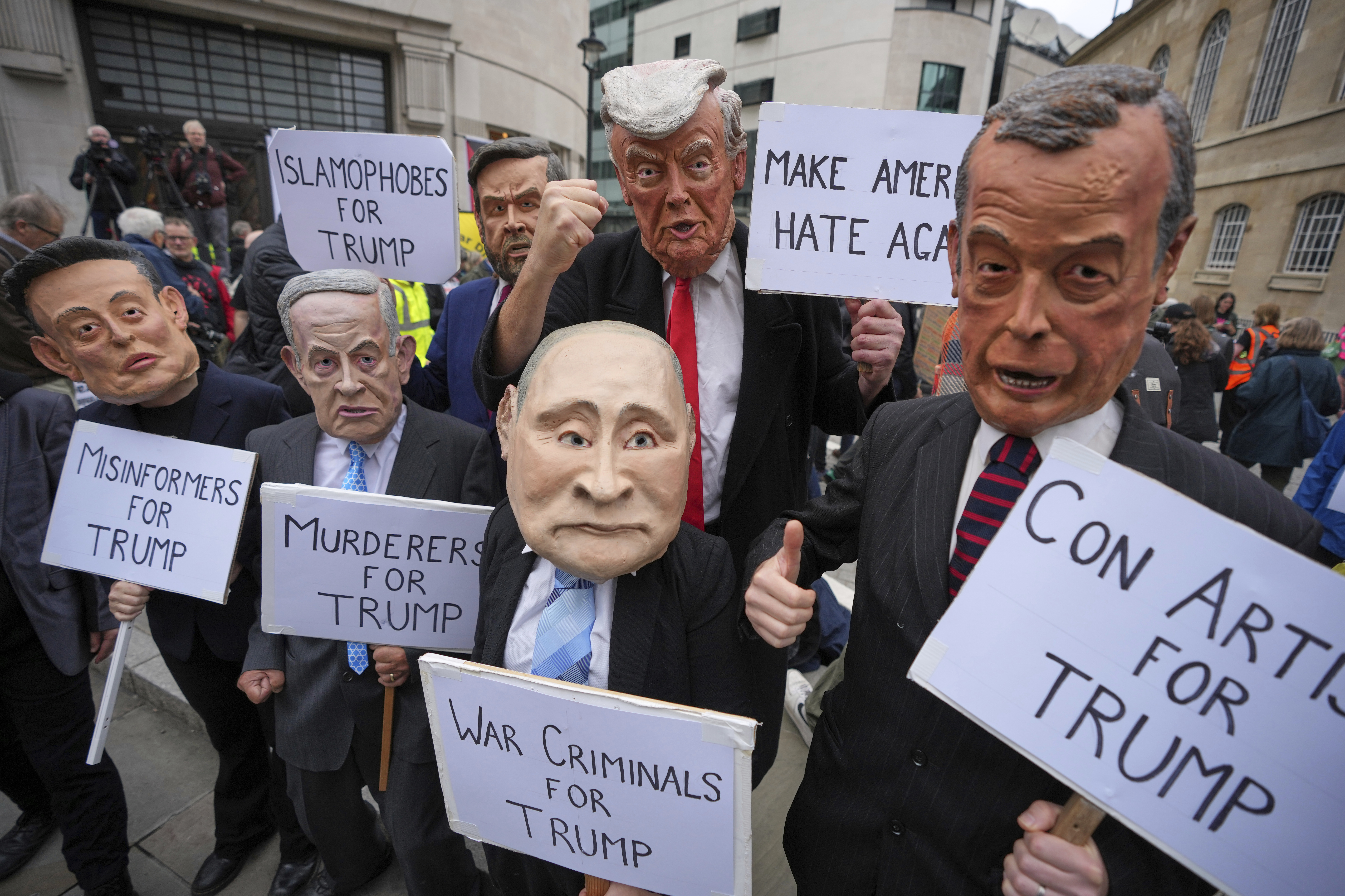 Protesters wear masks of politicians during a demonstration of the Stop Trump Coalition group against President Donald Trump's state visit in London, Wednesday, Sept. 17, 2025. (Kin Cheung - AP)