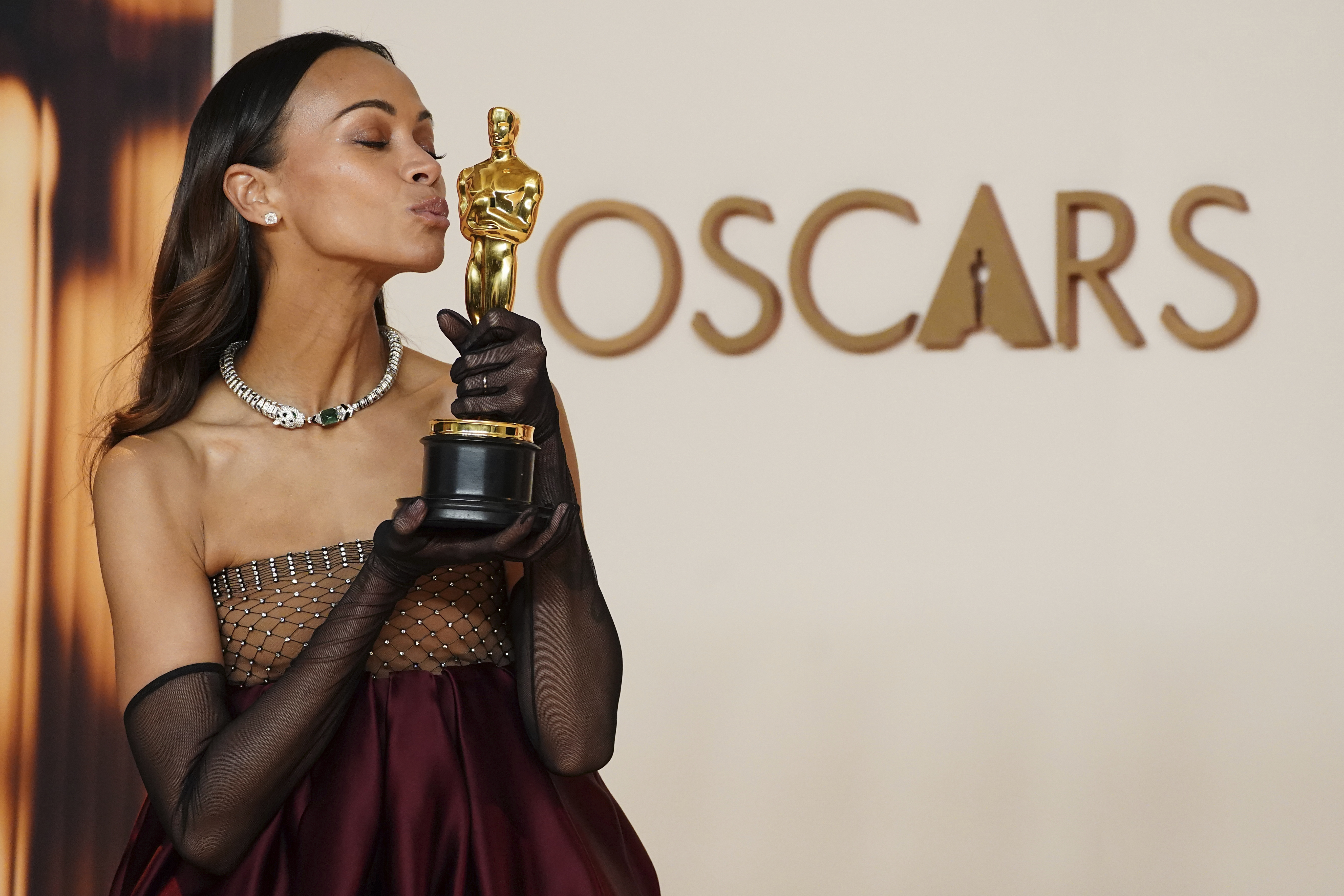 FILE - Zoe Saldana, winner of the award for best performance by an actress in a supporting role for