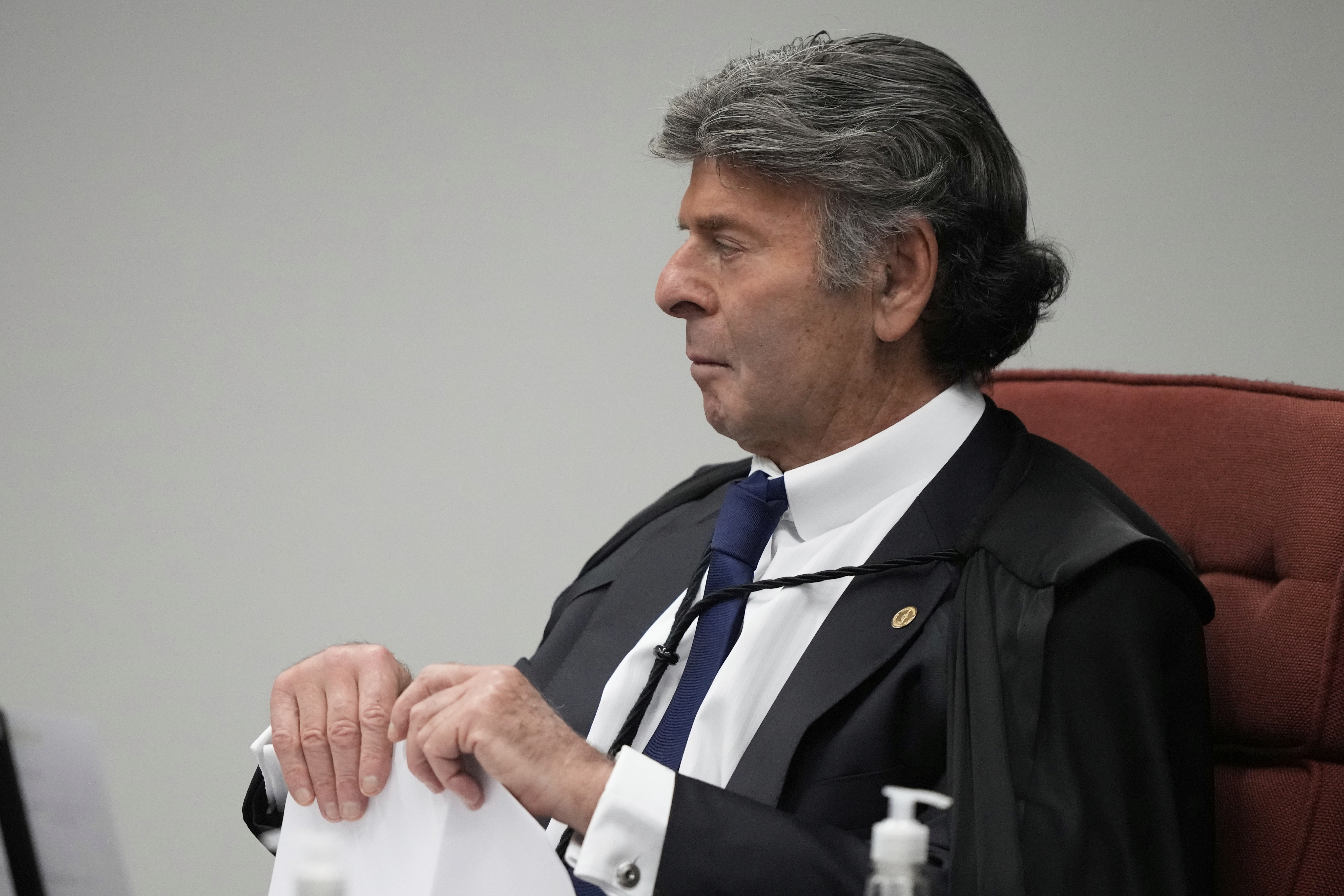 Supreme Court Justice Luiz Fux attends the verdict and sentencing phase of a trial for those charged in an alleged coup plot to keep Brazil's former President Jair Bolsonaro in office after his 2022 election defeat, in Brasilia, Brazil, Thursday, Sept. 11, 2025. (Eraldo Peres - AP)