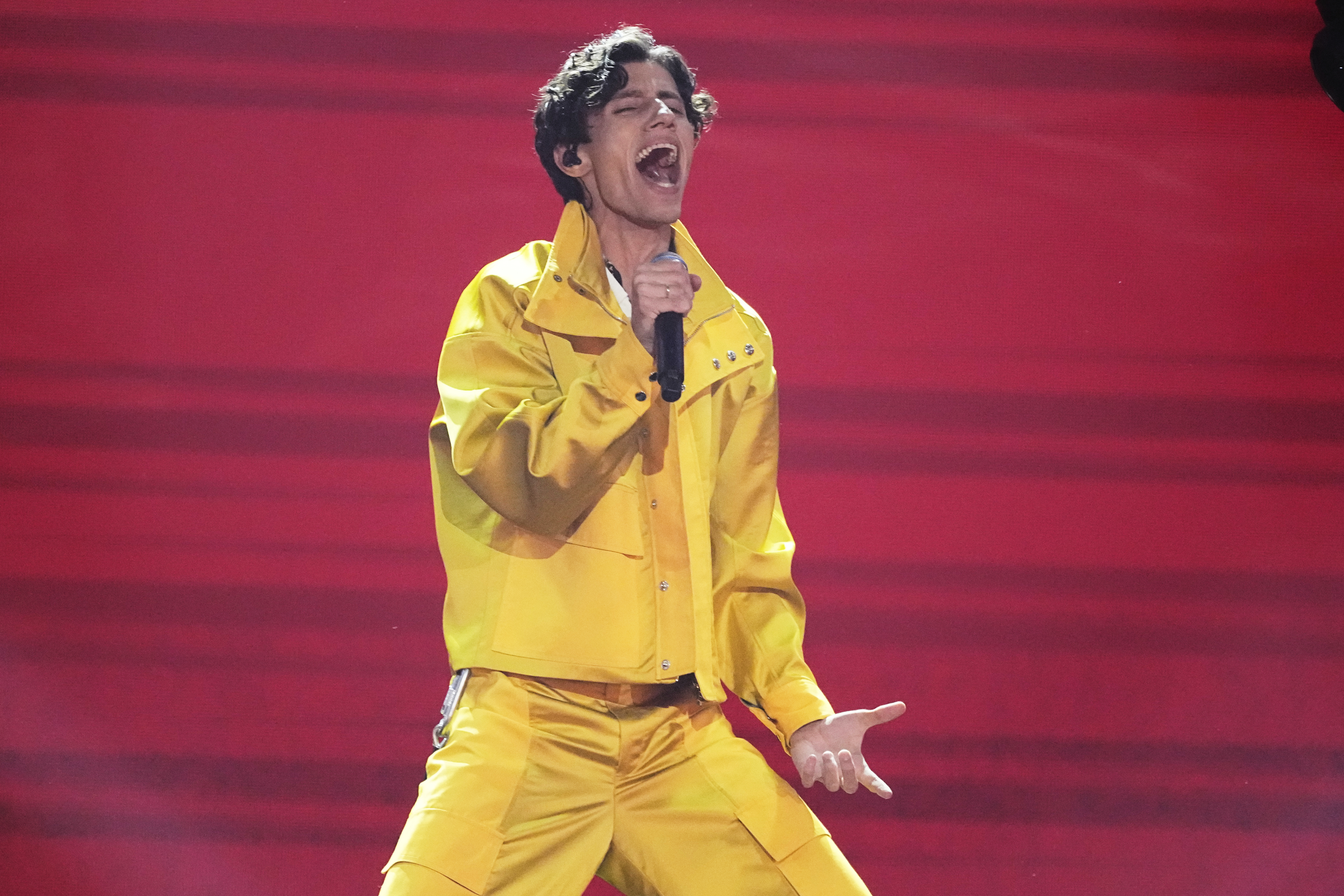 Tadjikistan's Farrukh Hasanov performs the song 