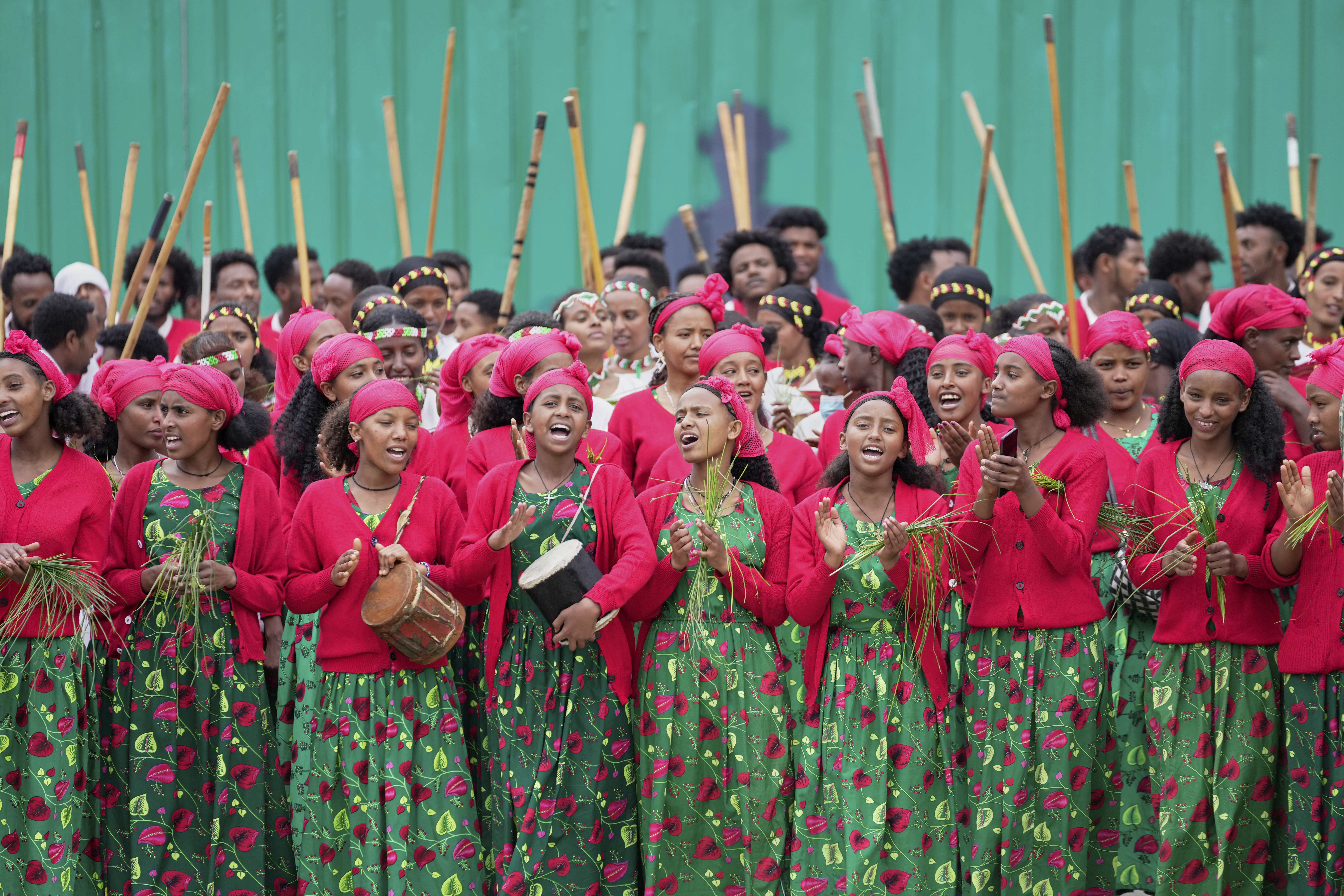 Ethiopian women wearing traditional clothes sing on the street as the Grand Ethiopian Renaissance Dam is inaugurated in Addis Ababa, Ethiopia, Tuesday, Sept. 9, 2025. (Brian Inganga - AP)