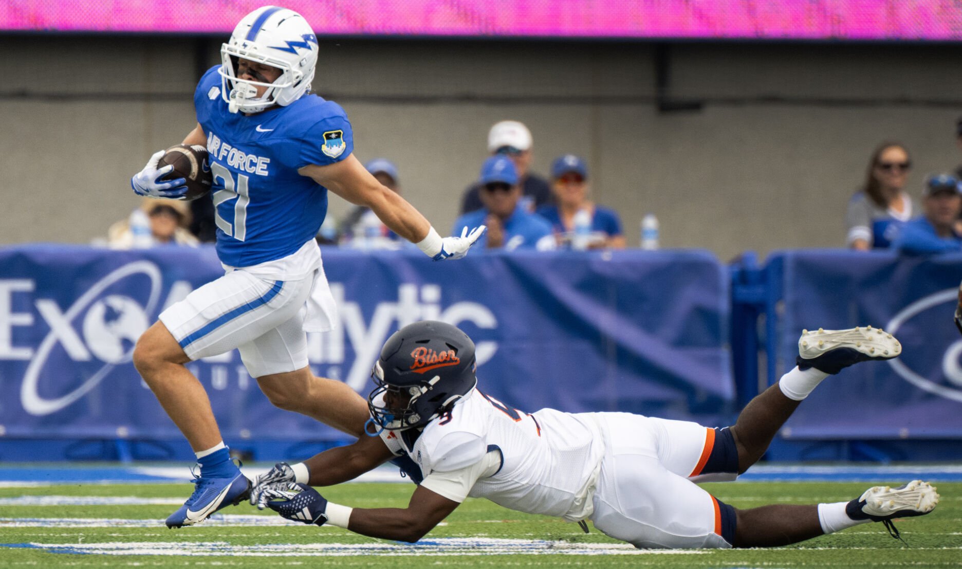 Falcons wide receiver Cade Harris runs past Bucknell safety Terian Williams II during the first half Aug. 30 at Falcon Stadium. (Christian Murdock, The Gazette)