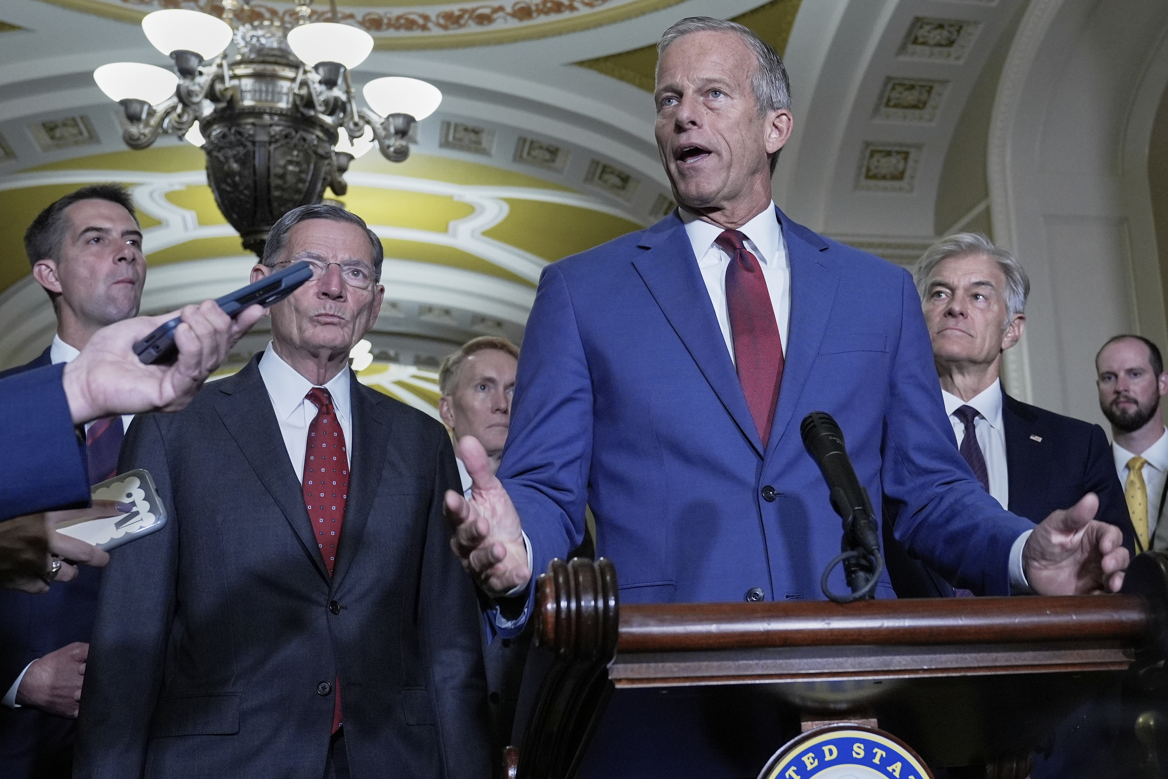 Sen. Majority Leader John Thune, R-S.D., center, speaks during a news conference after a policy luncheon at the Capitol, Tuesday, Sept. 16, 2025, in Washington. (Mariam Zuhaib - AP)