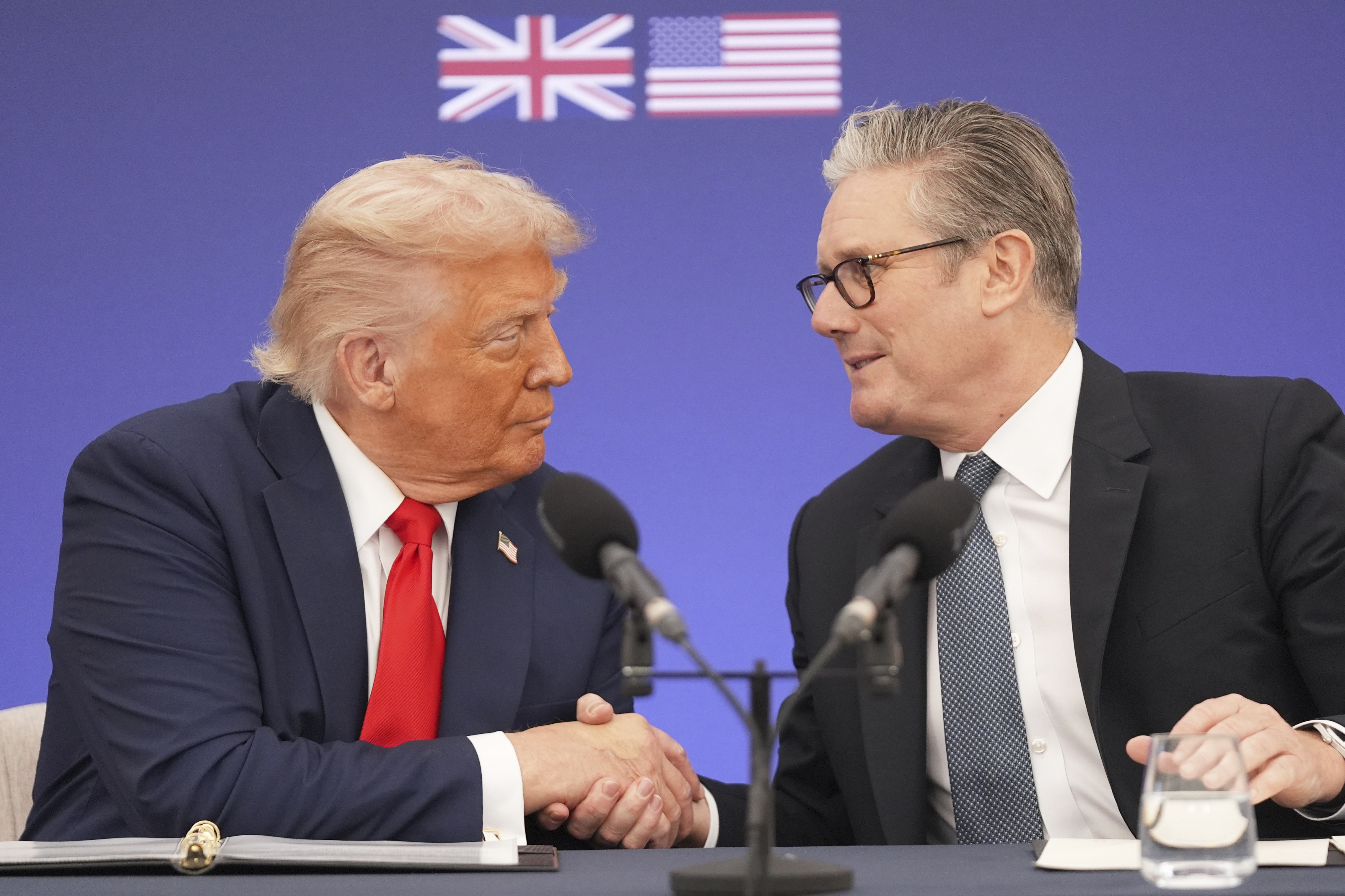President Donald Trump and Britain's Prime Minister Keir Starmer shake hands during a business roundtable at Chequers near Aylesbury, England, Thursday, Sept. 18, 2025. (Evan Vucci - AP)