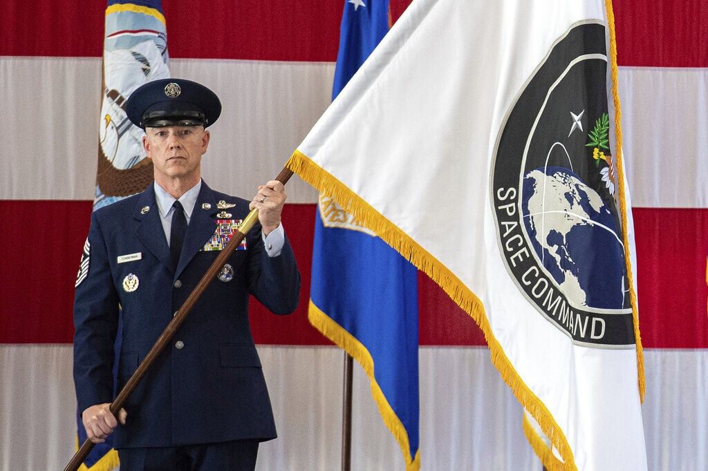 FILE — A presentation of the U.S. Space Command colors, Sept. 9, 2019, during a ceremony to recognize the establishment of the United States Space Command at Peterson Air Force Base in Colorado Springs. (Christian Murdock, The Gazette file)