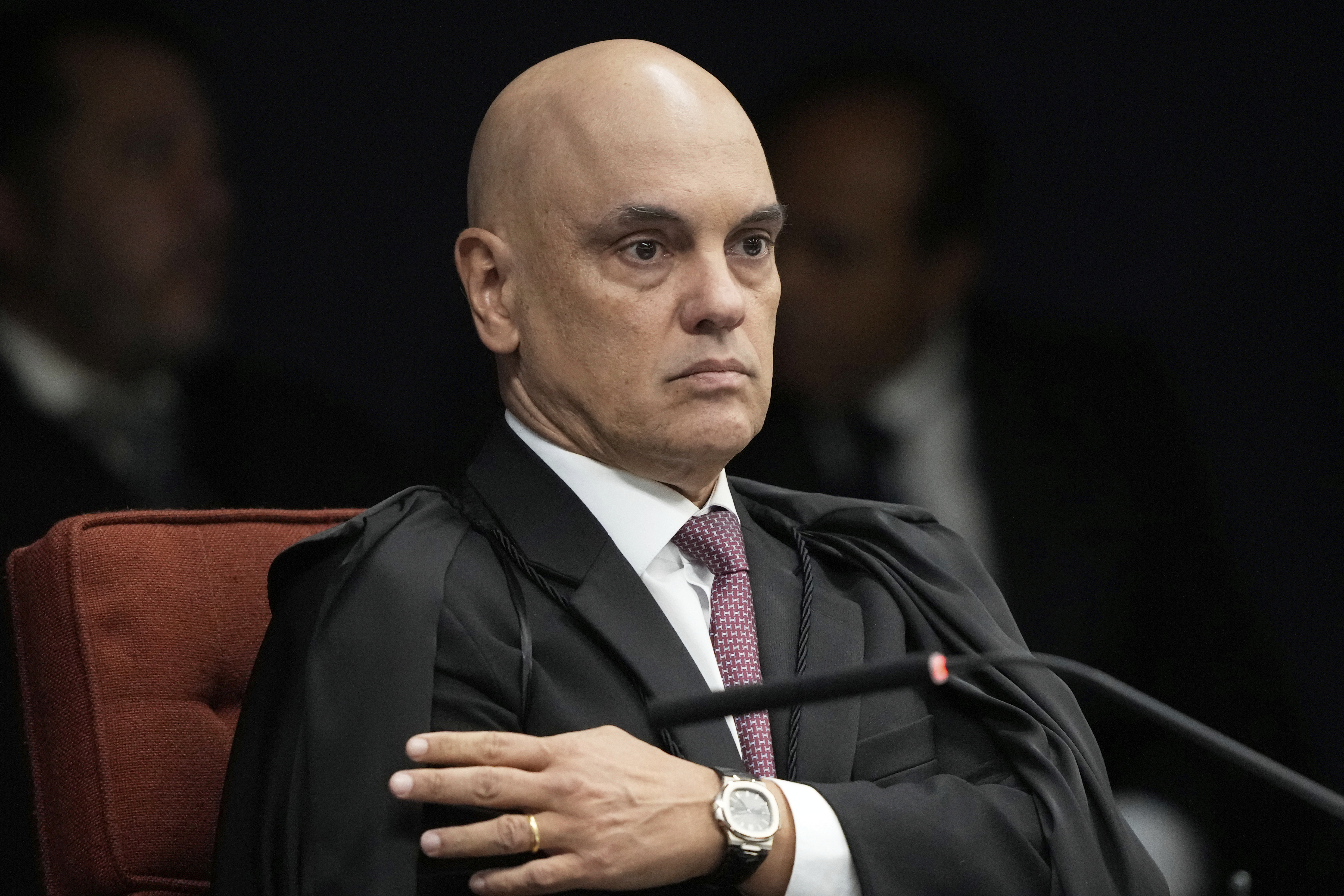Supreme Court Justice Alexandre de Moraes attends the verdict and sentencing phase of a trial for those charged in an alleged coup plot to keep Brazil's former President Jair Bolsonaro in office after his 2022 election defeat, in Brasilia, Brazil, Thursday, Sept. 11, 2025. (Eraldo Peres - AP)