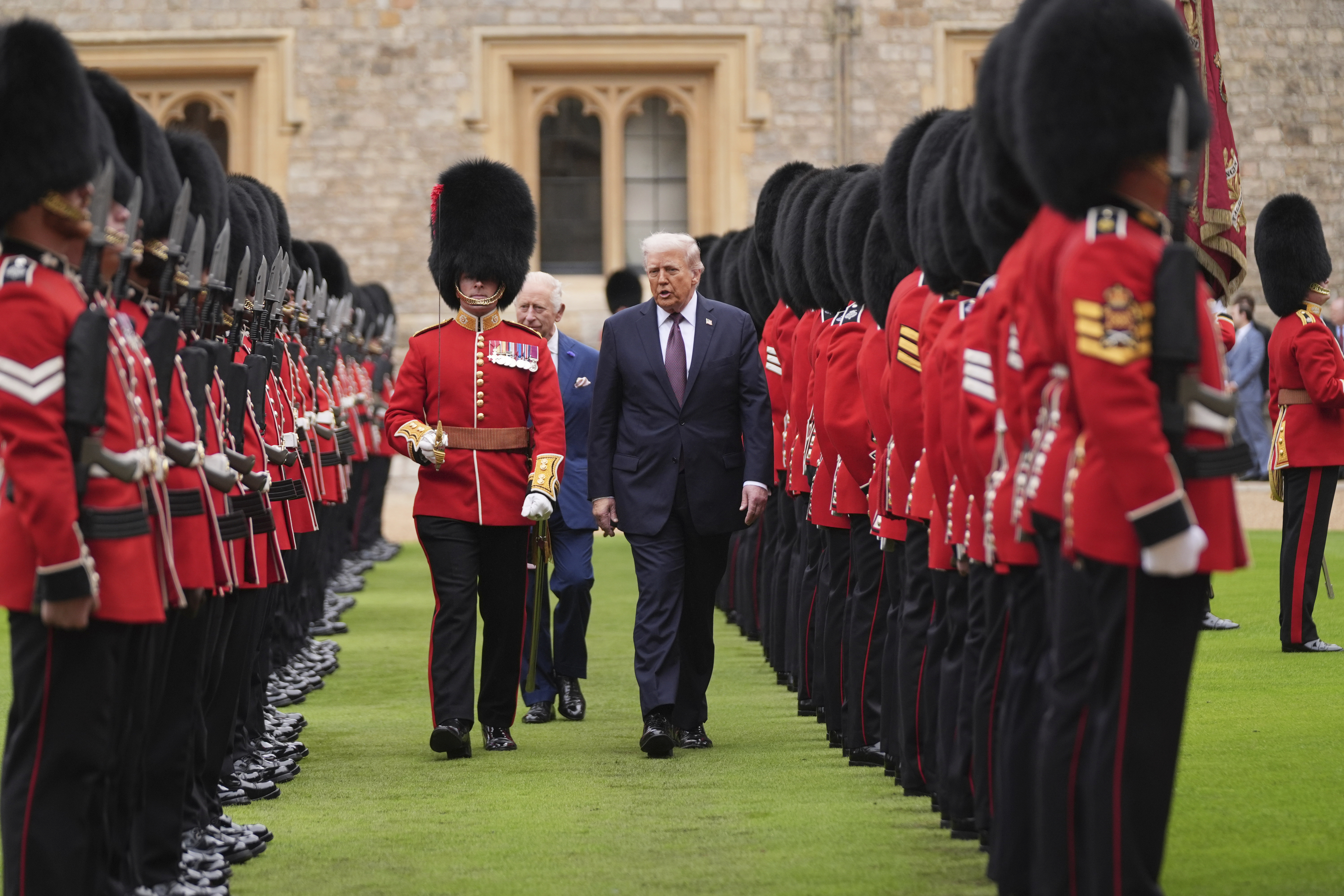 President Donald Trump and Britain's King Charles III inspect the guard of honor during an arrival ceremony at Windsor Castle, in Windsor, England, Wednesday, Sept. 17, 2025. (Evan Vucci - AP)