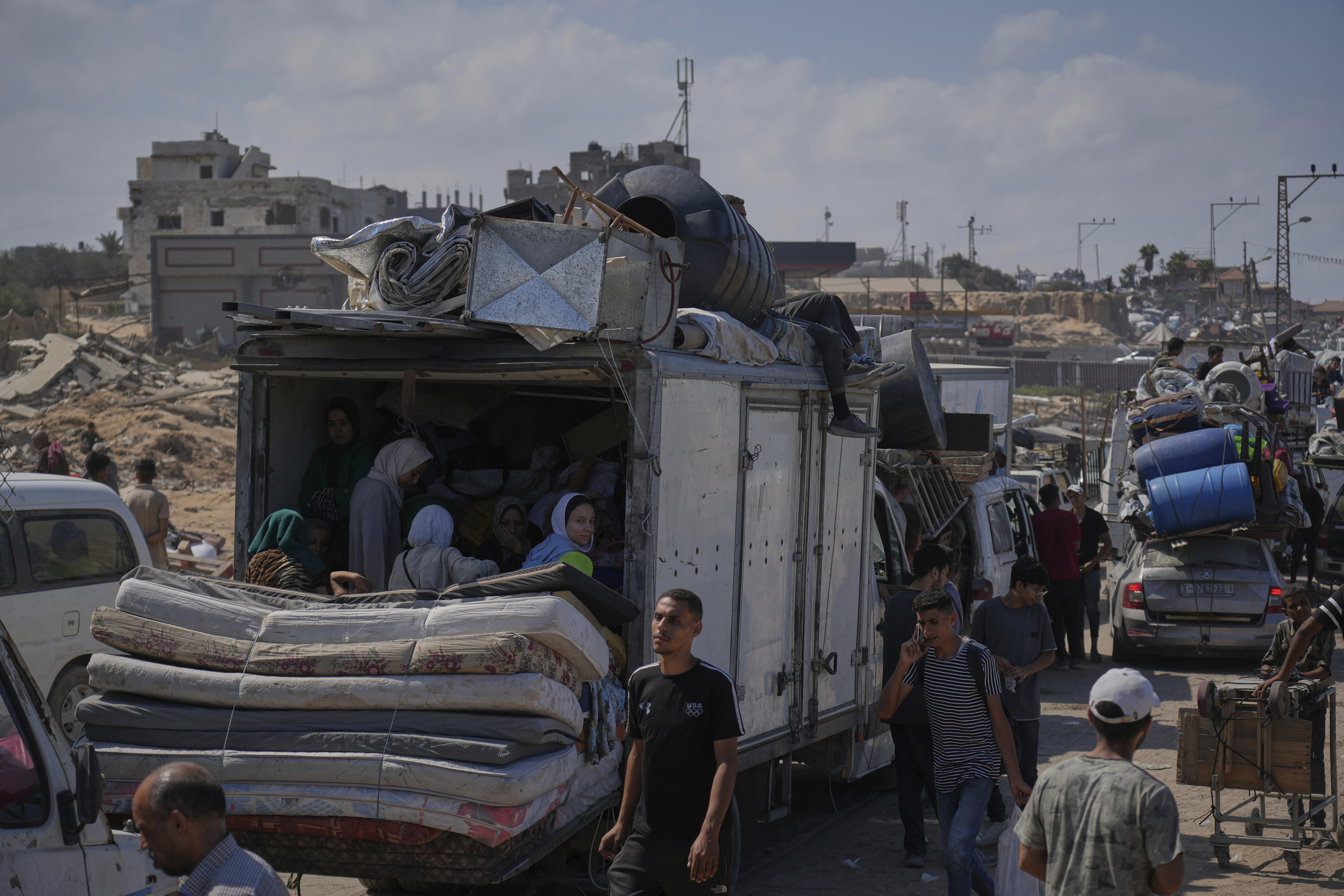 Displaced Palestinians flee northern Gaza along the coastal road toward the south, as Israel announced an expanded operation in Gaza City, Tuesday, Sept. 16, 2025. (Abdel Kareem Hana - AP)