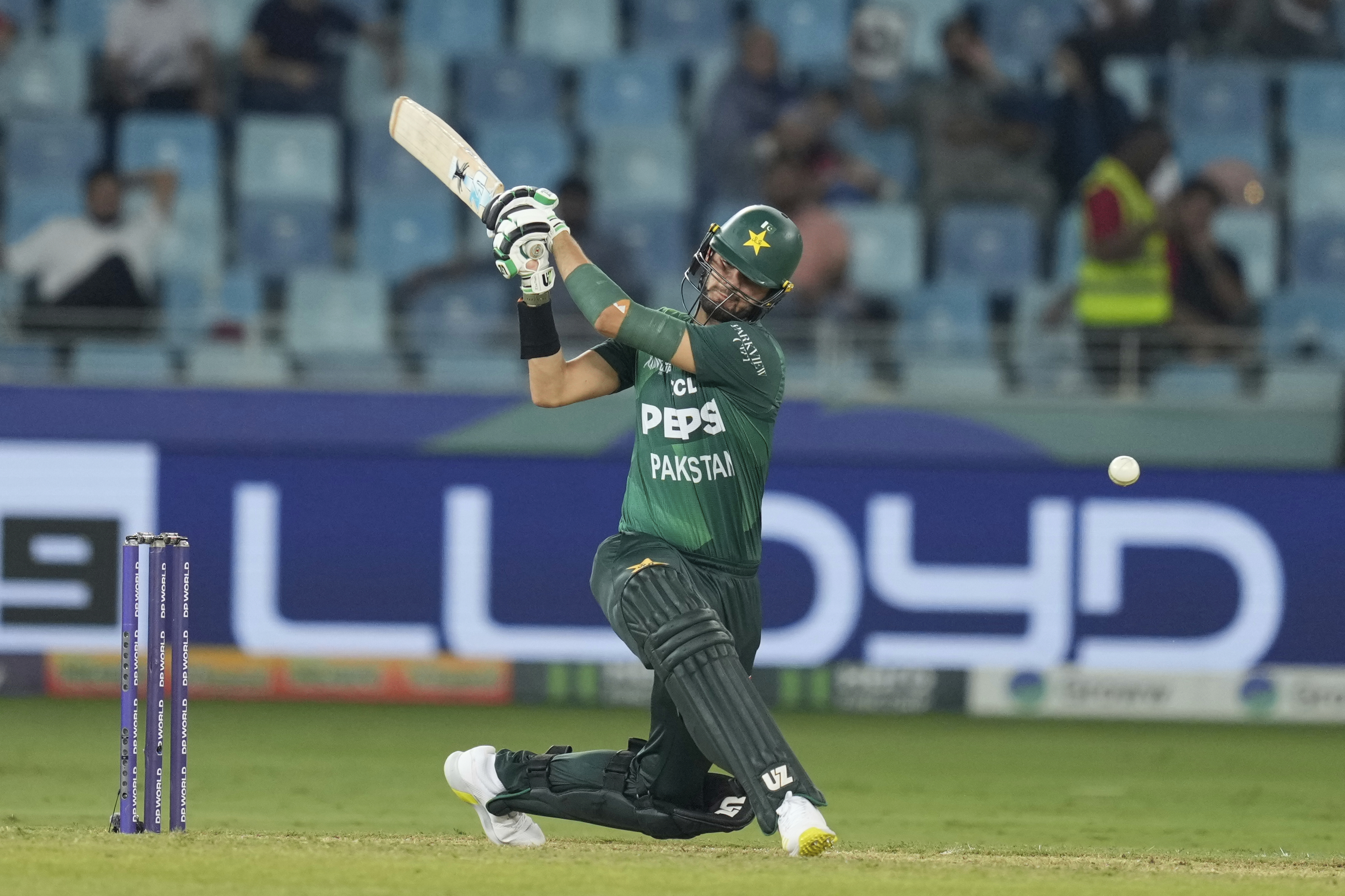 Pakistan's Shaheen Shah Afridi plays a shot during the Asia Cup cricket match between Pakistan and United Arab Emirates at Dubai International Cricket Stadium, United Arab Emirates, Wednesday, Sept. 17, 2025. (Altaf Qadri - AP)