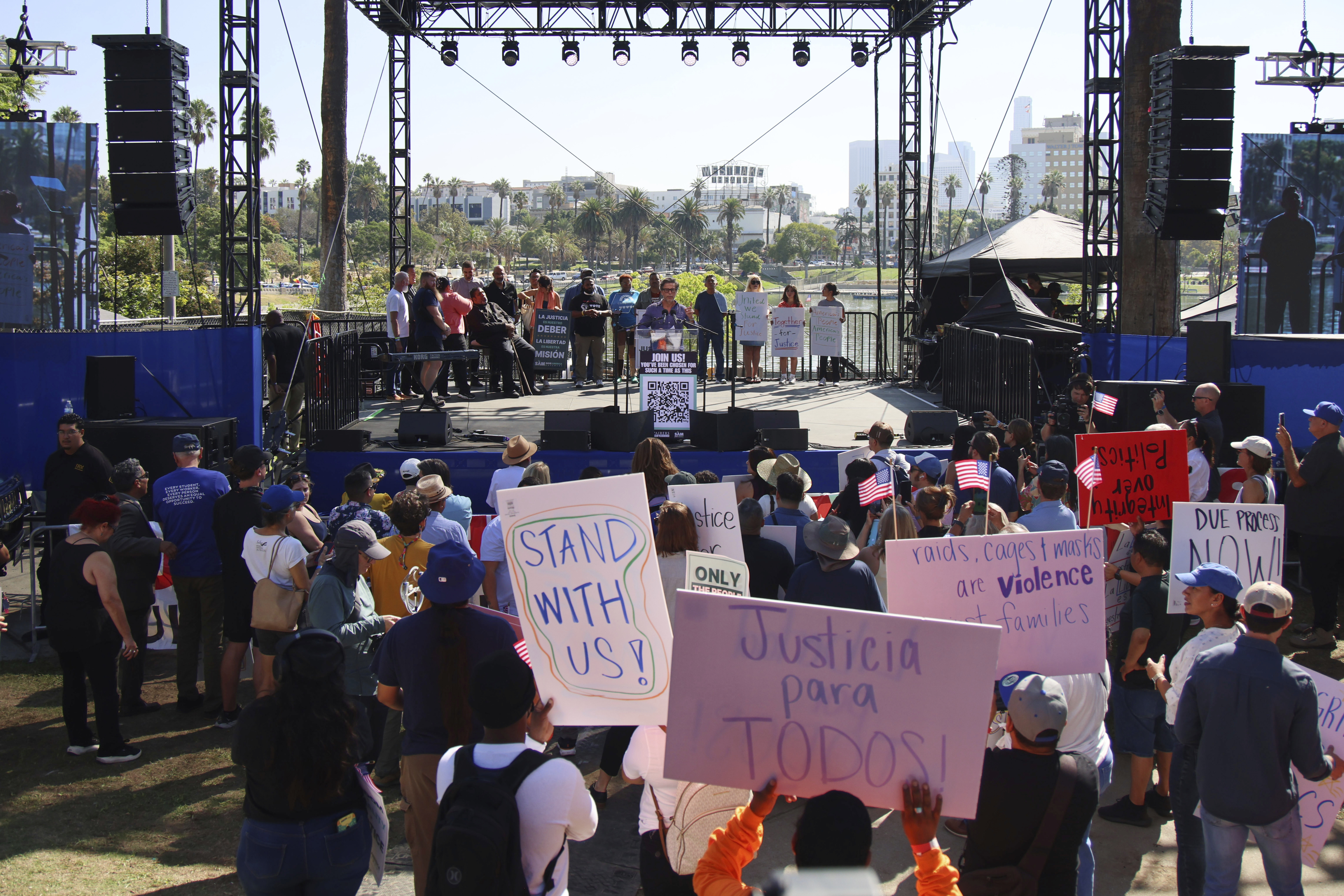 Supporters gather around a stage during an immigration rally on Saturday, Sept. 20, 2025, in Los Angeles. (Ethan Swope - FR171736 AP)