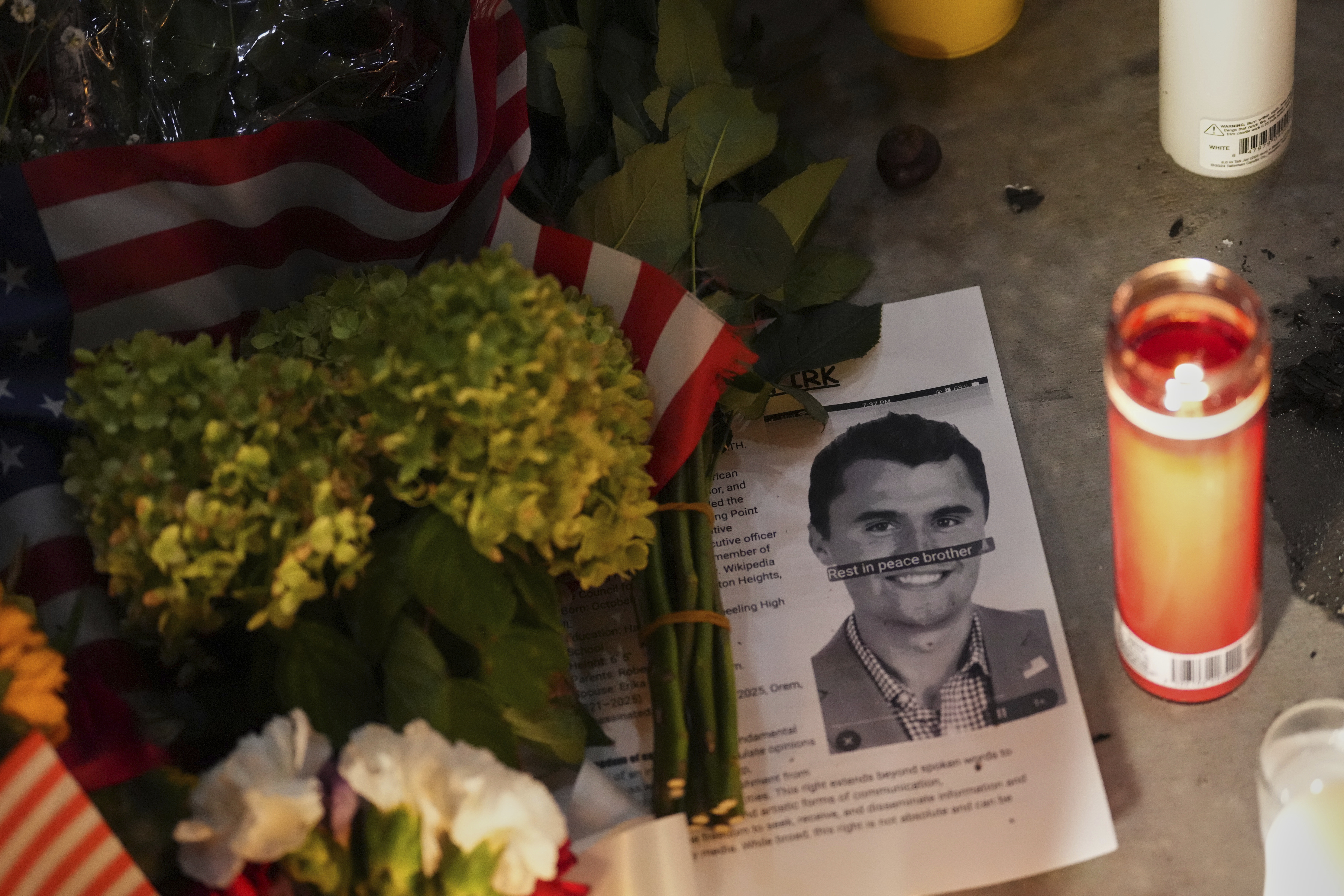 A photo Charlie Kirk, the CEO and co-founder of Turning Point USA who was shot and killed, sits at a vigil in his memory, Thursday, Sept. 11, 2025, in Orem, Utah. (Lindsey Wasson - AP)