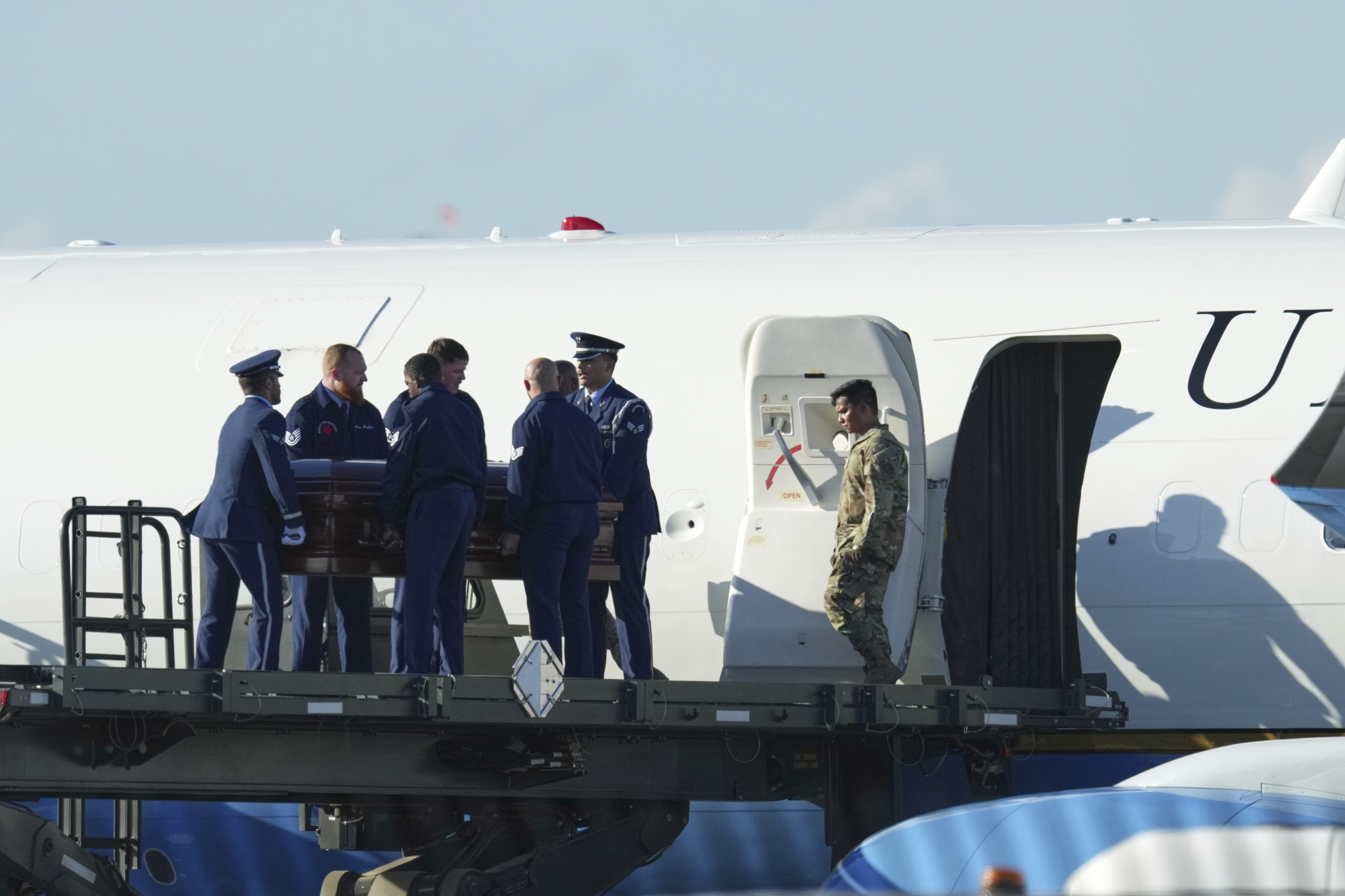 The casket containing the body of Charlie Kirk, the CEO and co-founder of Turning Point USA who was shot and killed on Wednesday is removed from Air Force Two at Phoenix Sky Harbor International Airport, Thursday, Sept. 11, 2025, in Phoenix. (Ross D. Franklin - AP)