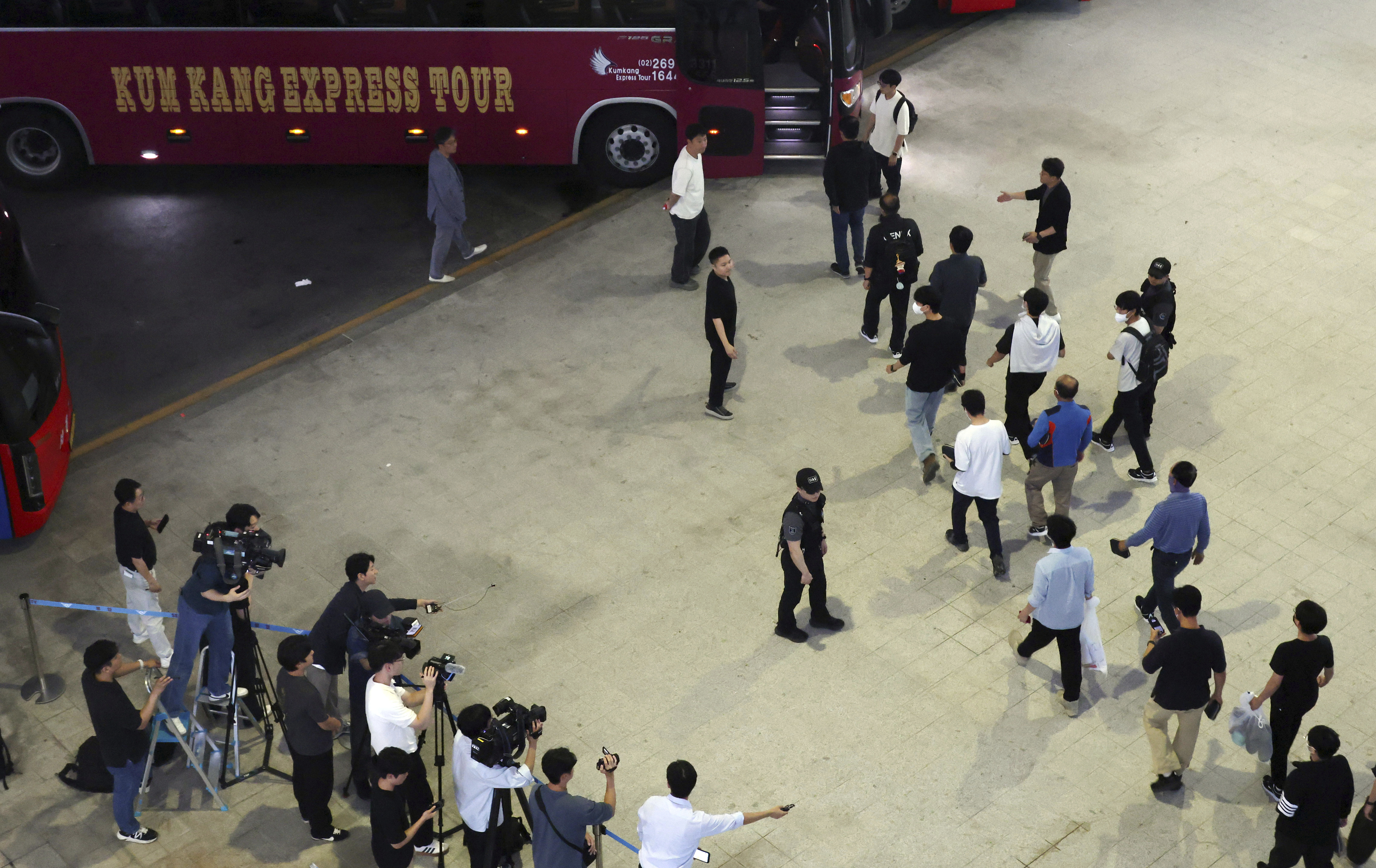 South Korean workers released after days of detention in Georgia, arrive at the Incheon International Airport, in Incheon, South Korea, Friday, Sept. 12, 2025. (Uncredited - Yonhap)