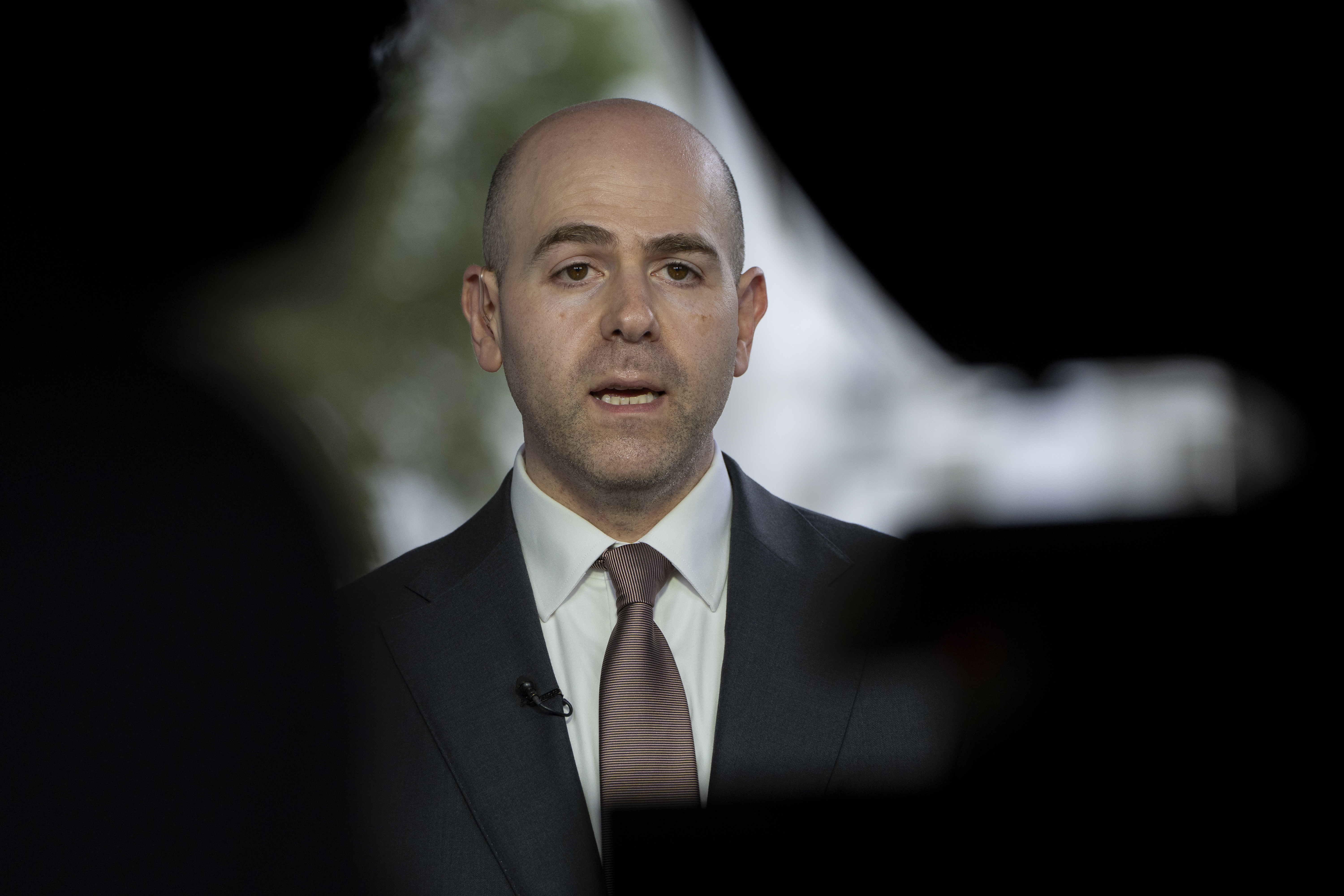 Stephen Miran, chairman of the Council of Economic Advisors and President Donald Trump's pick to serve on the Federal Reserve, speaks during a television interview at the White House, Tuesday, Aug. 12, 2025, in Washington. (Alex Brandon - AP)
