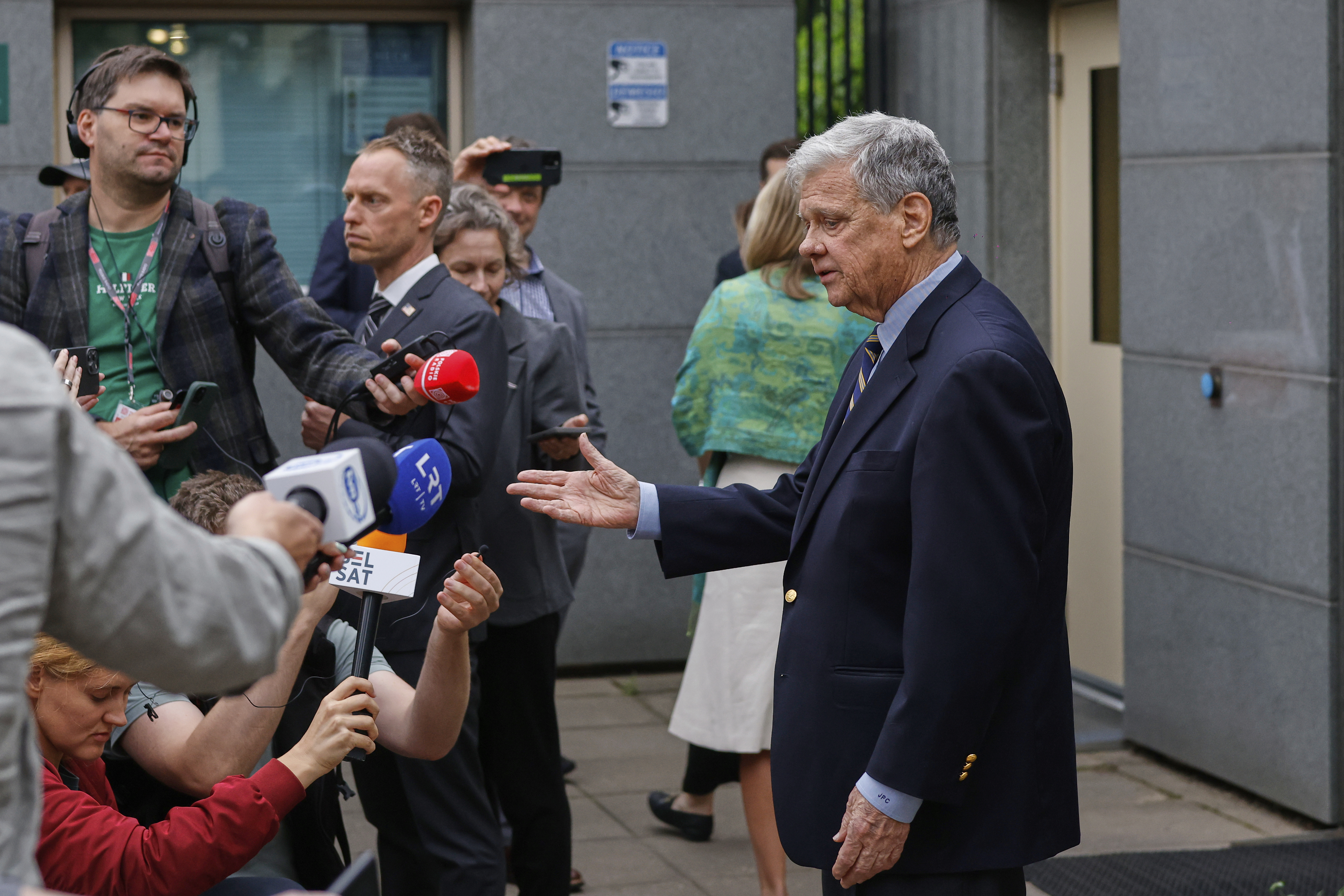 U.S. Presidential envoy John Coale, right, speaks to journalists outside the U.S. Embassy in Vilnius, Lithuania, Thursday, Sept. 11, 2025, ahead of the arrival of released prisoners from Belarus. (Mindaugas Kulbis - AP)