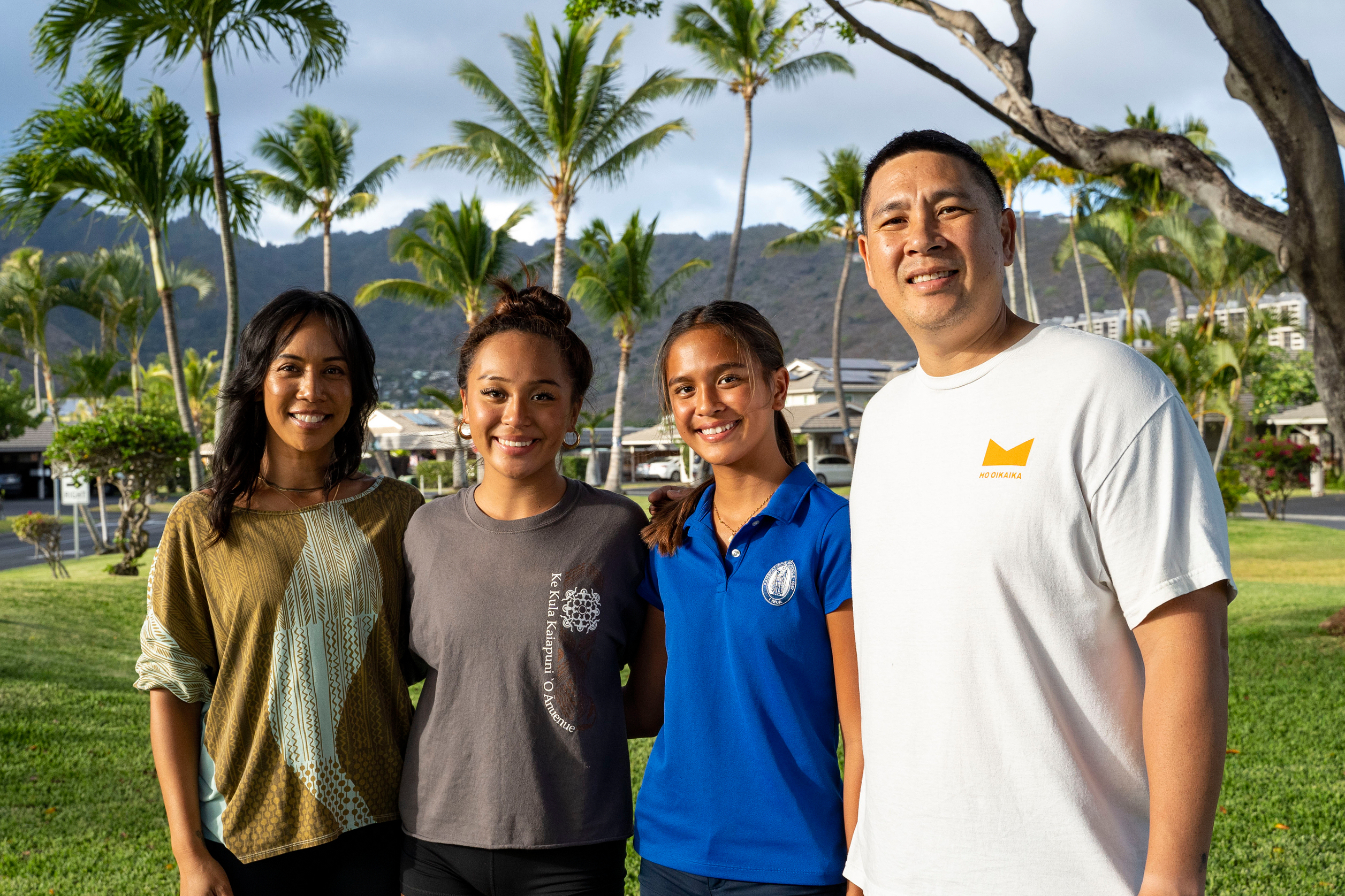 Kapua Ong, second from right, poses for a family portrait with her parents and sister in Honolulu, on Thursday, Sept. 11, 2025. (Mengshin Lin - FR172028 AP)