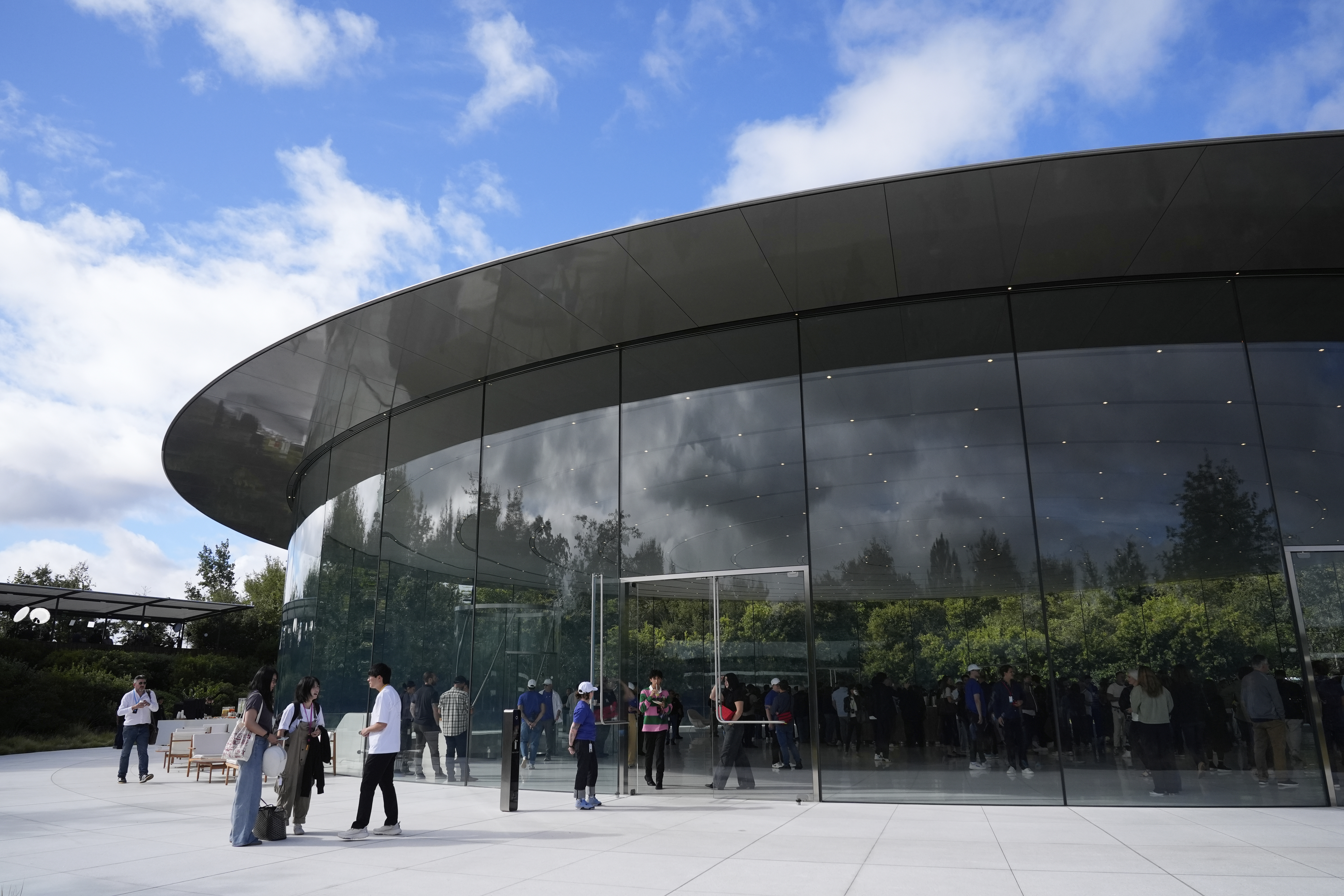 Attendees arrive at the Steve Jobs Theater for an announcement of new products at Apple Park on Tuesday, Sept. 9, 2025, in Cupertino, Calif. (Godofredo A. Vásquez - AP)