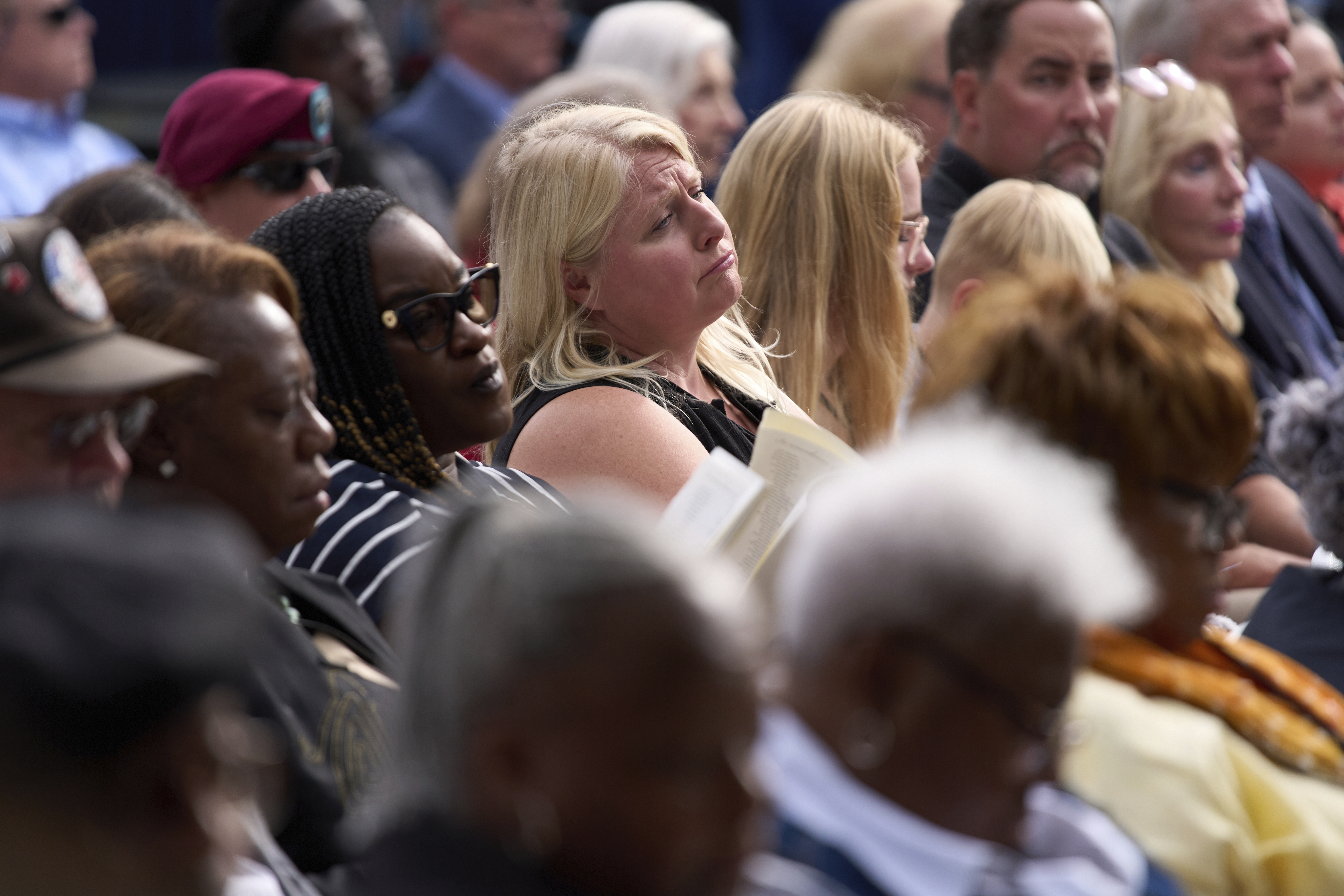 People listen as names of those killed are read during a ceremony attended by President Donald Trump to commemorate the 24th anniversary of the 9/11 attacks, Thursday, Sept. 11, 2025, at the Pentagon in Washington. (Evan Vucci - AP)