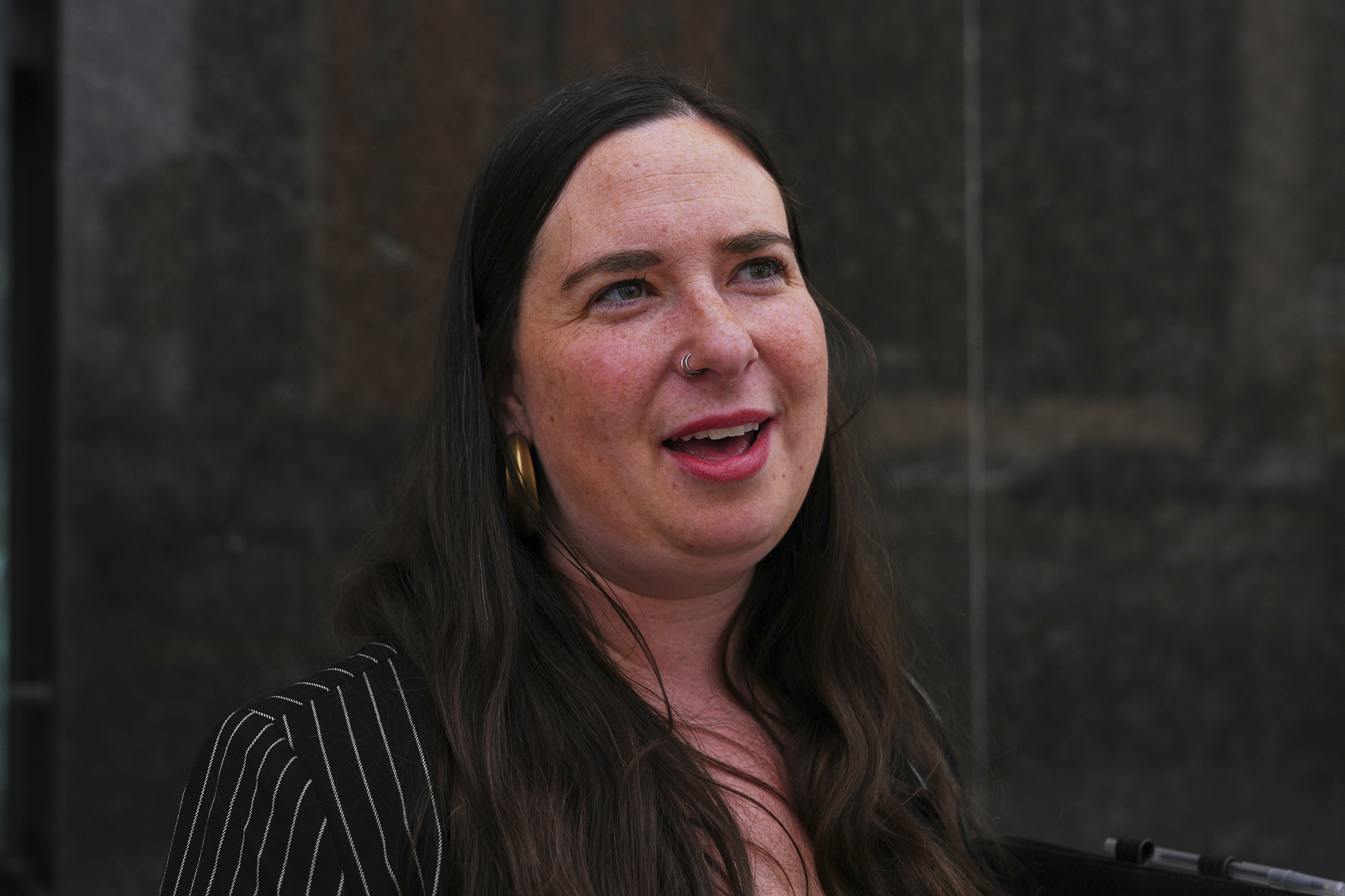 Sara Garber, attorney for Chengxuan Han, one of two Chinese scientists accused of smuggling or shipping biological material to the United States, speaks after a sentencing hearing at the U.S. District Court, Wednesday, Sept. 10, 2025, in Detroit. (Ryan Sun - AP)