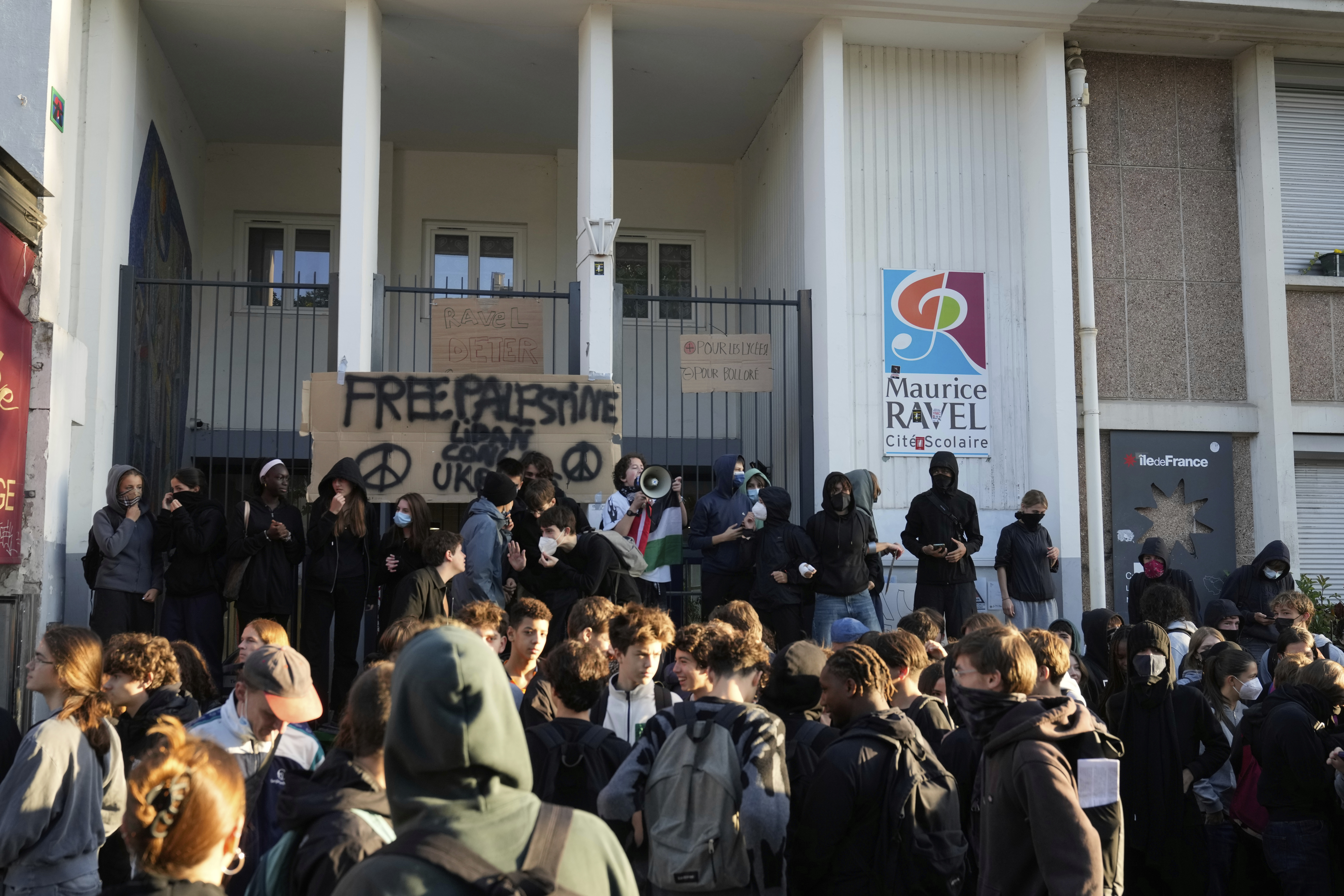 Students block the entrance of a school during a protest called by major trade unions to oppose budget cuts, in Paris, France, Thursday, Sept. 18, 2025. (Michel Euler - AP)