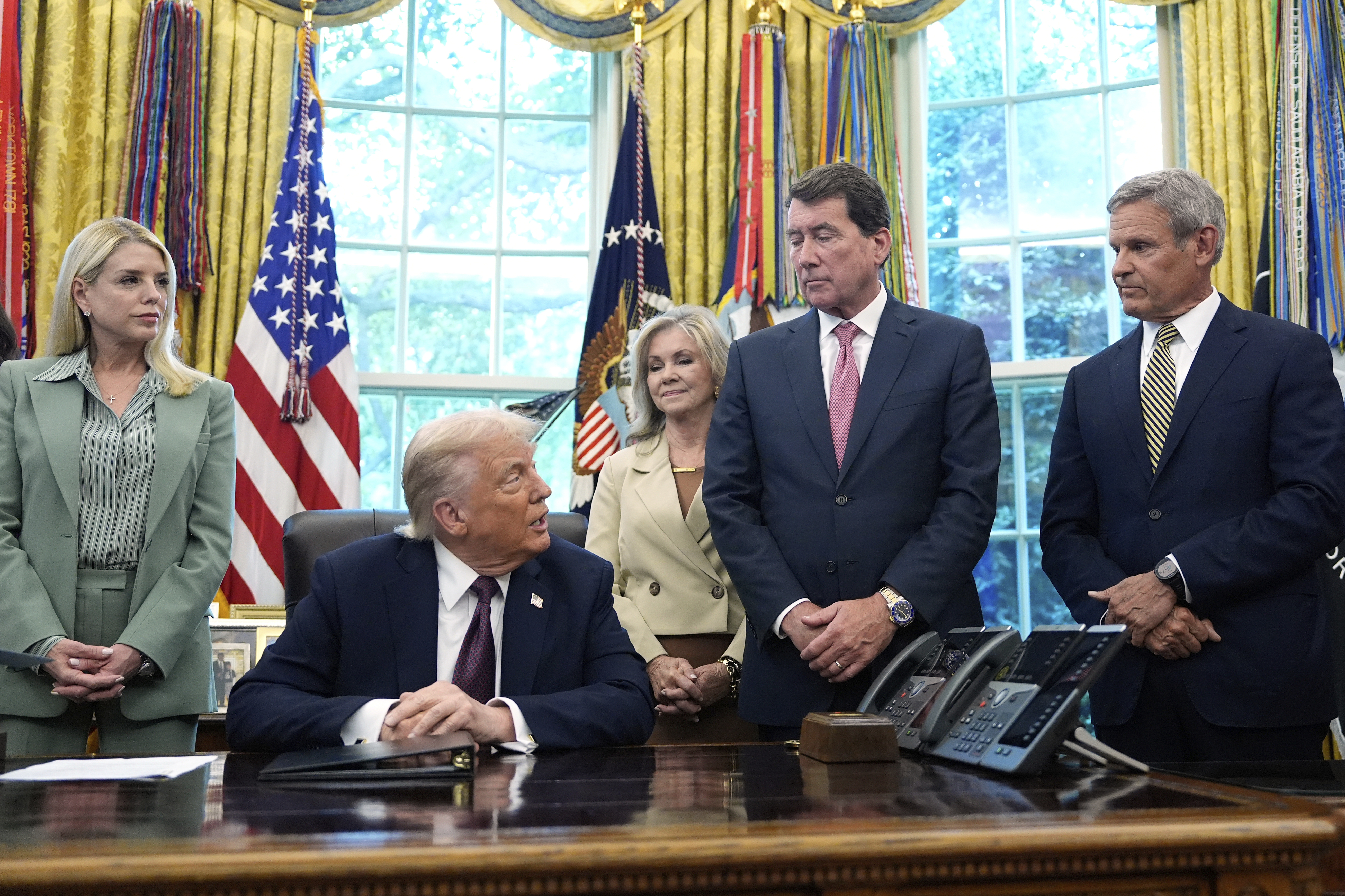 President Donald Trump speaks as Attorney General Pam Bondi, from left, Sen. Marsha Blackburn, R-Tenn., Sen. Bill Hagerty, R-Tenn., and Tennessee Gov. Bill Lee listen in the Oval Office of the White House, Monday, Sept. 15, 2025, in Washington. (Alex Brandon - AP)