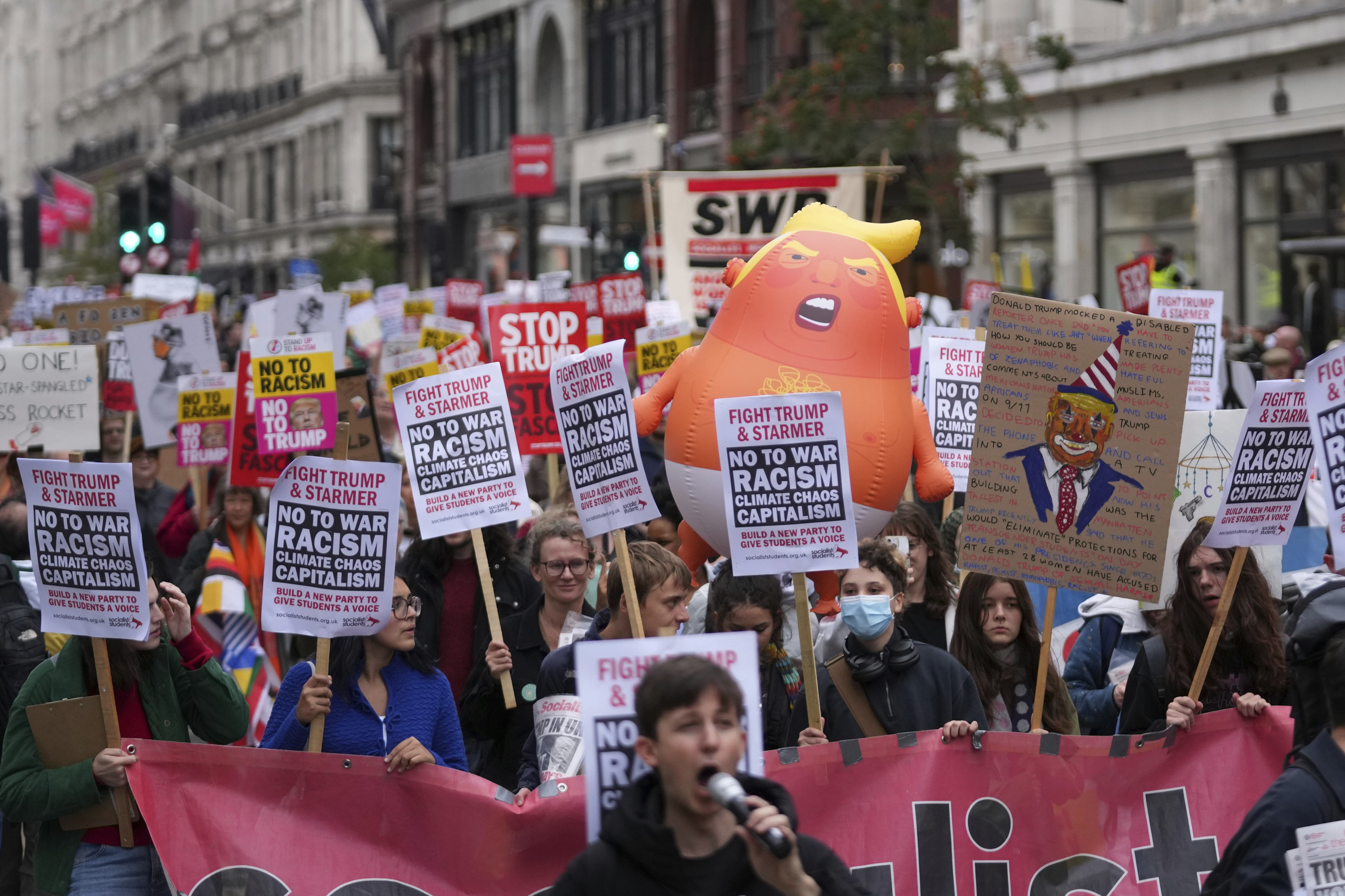 Protesters join a demonstration of the Stop Trump Coalition group against President Donald Trump's state visit in London, Wednesday, Sept. 17, 2025. (Joanna Chan - AP)