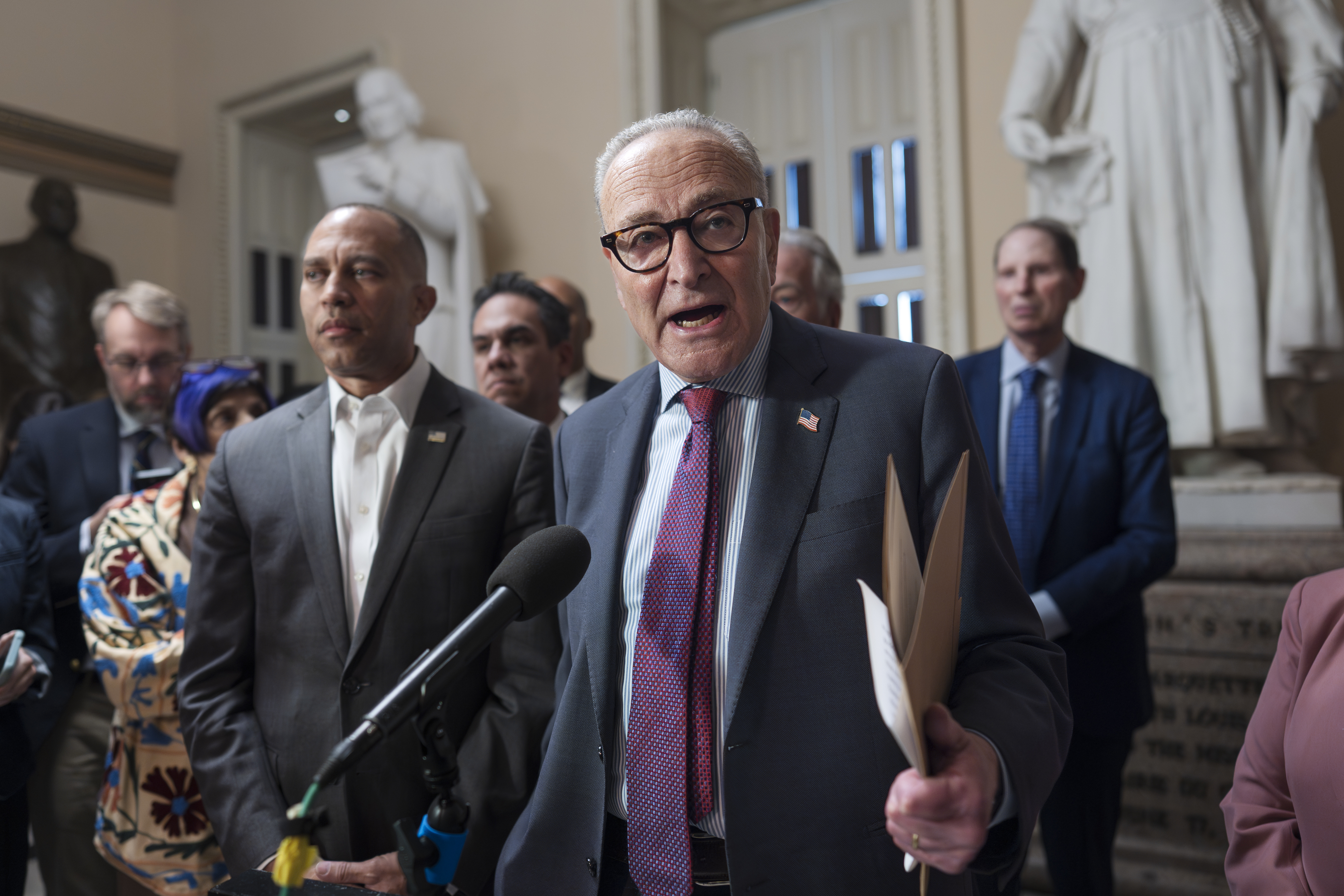 House Democratic Leader Hakeem Jeffries, left, and Senate Democratic Leader Chuck Schumer, both of New York, tell reporters that they are united as the Sept. 30 funding deadline approaches, at the Capitol in Washington, Thursday, Sept. 11, 2025. (J. Scott Applewhite - AP)