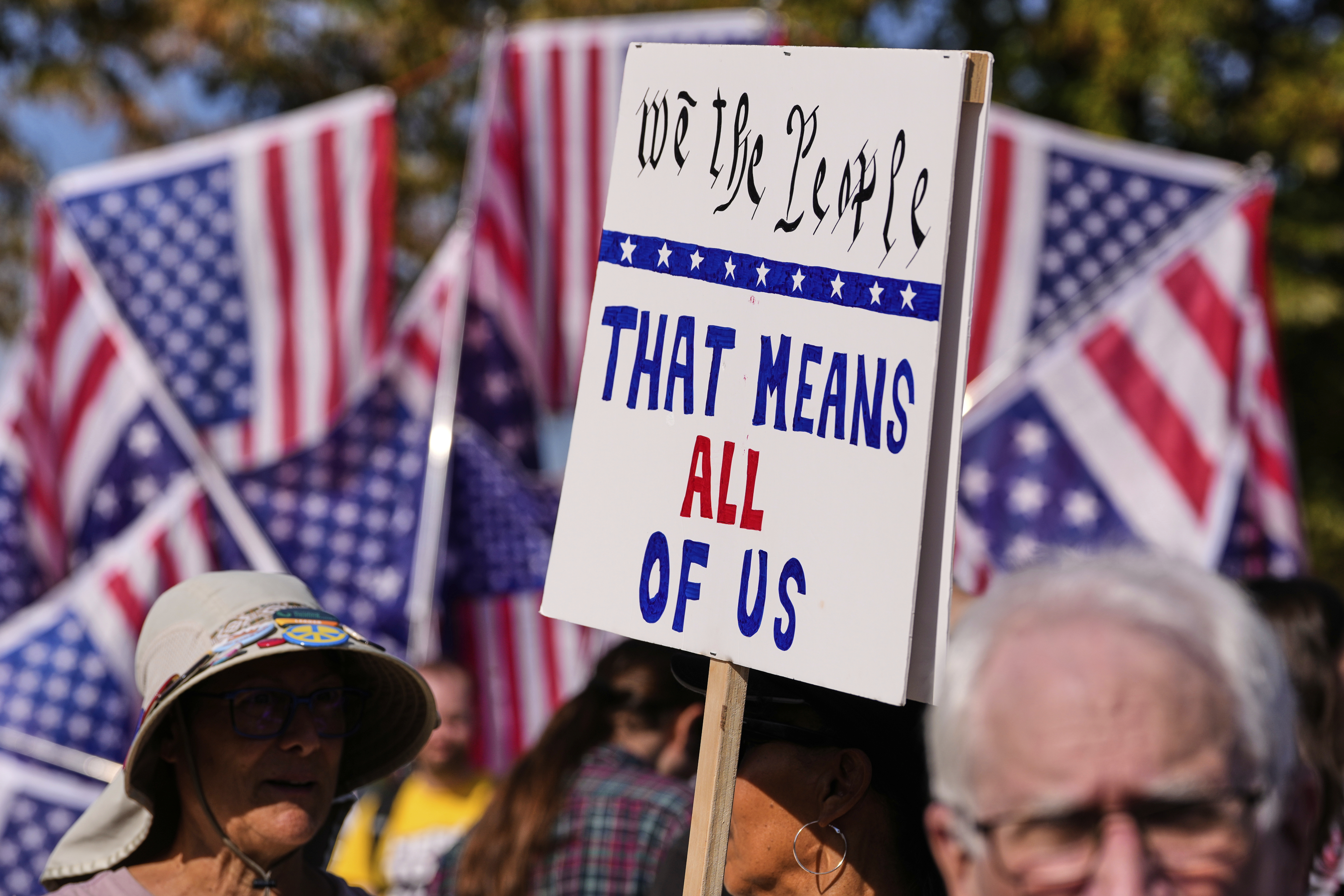 Protesters gather outside the U.S. Immigration and Customs Enforcement regional field office, Tuesday, Sept. 16, 2025, in Burlington, Mass. (Charles Krupa - AP)