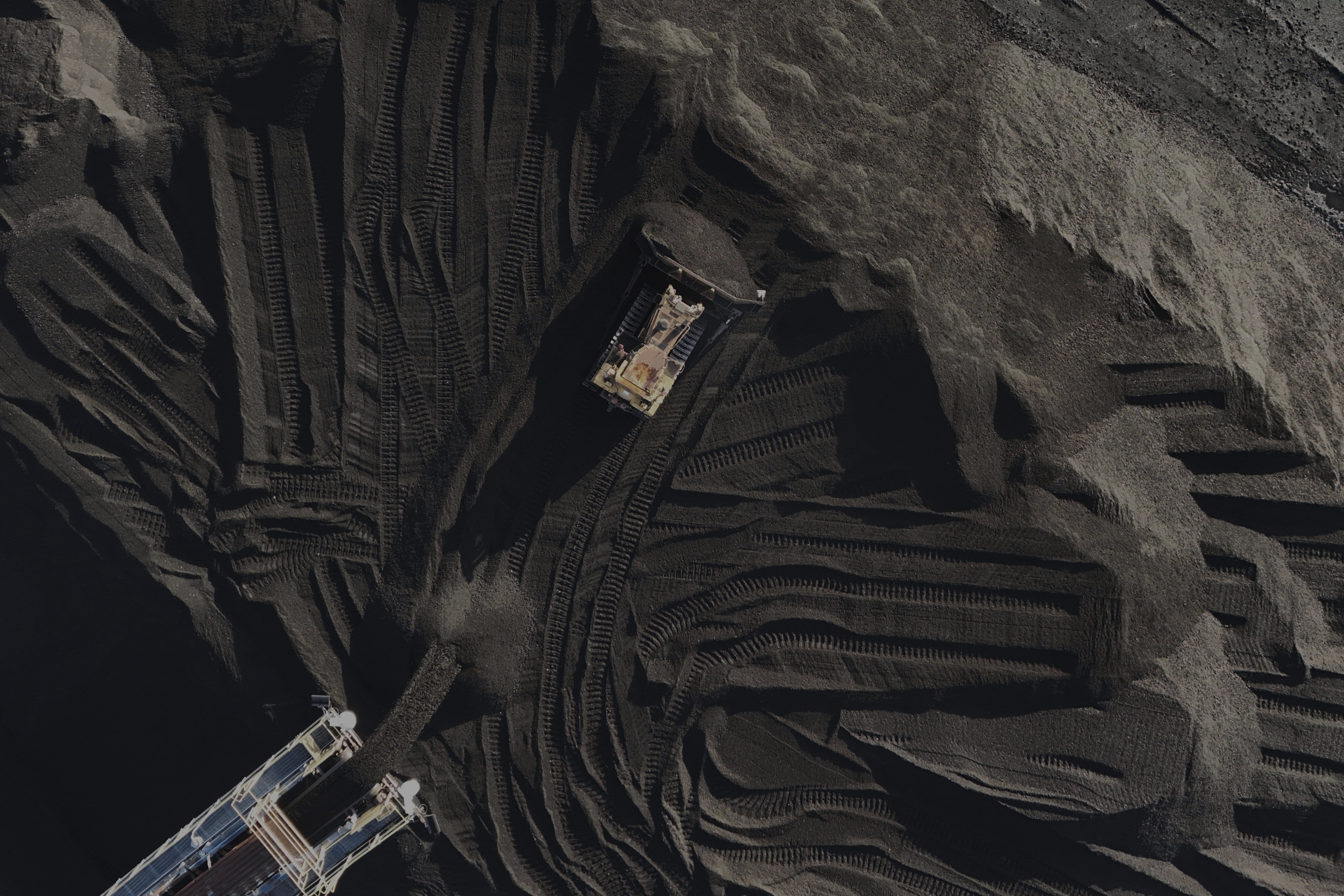 FILE - A bulldozer moves coal April 10, 2025, in Princeton, Ind. (Joshua A. Bickel - AP)