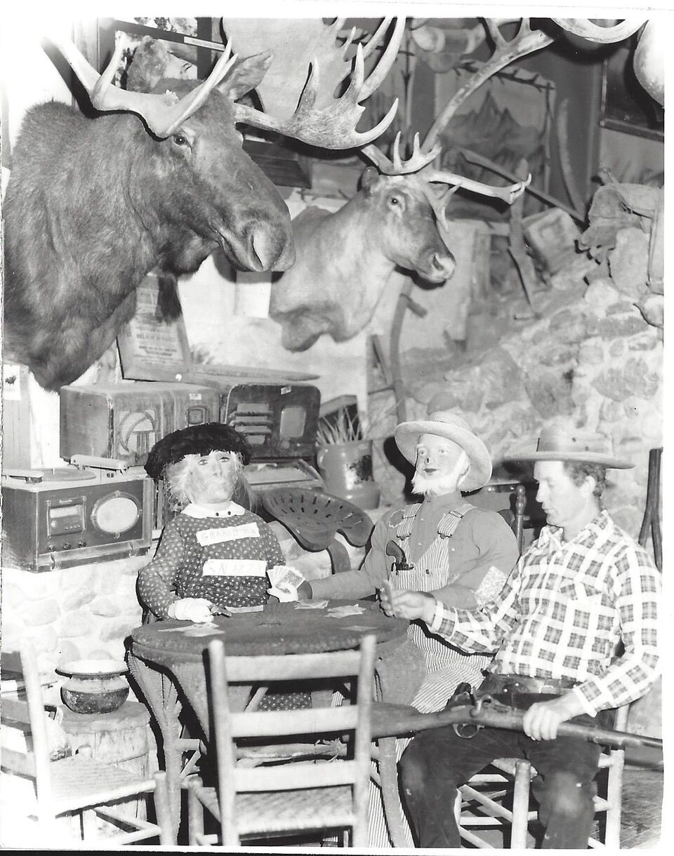 Jerry Chubbuck, who oversaw the World’s Wonder View Tower from the 1960s until his death in 2013, plays cards with mannequins. (Courtesy photo)