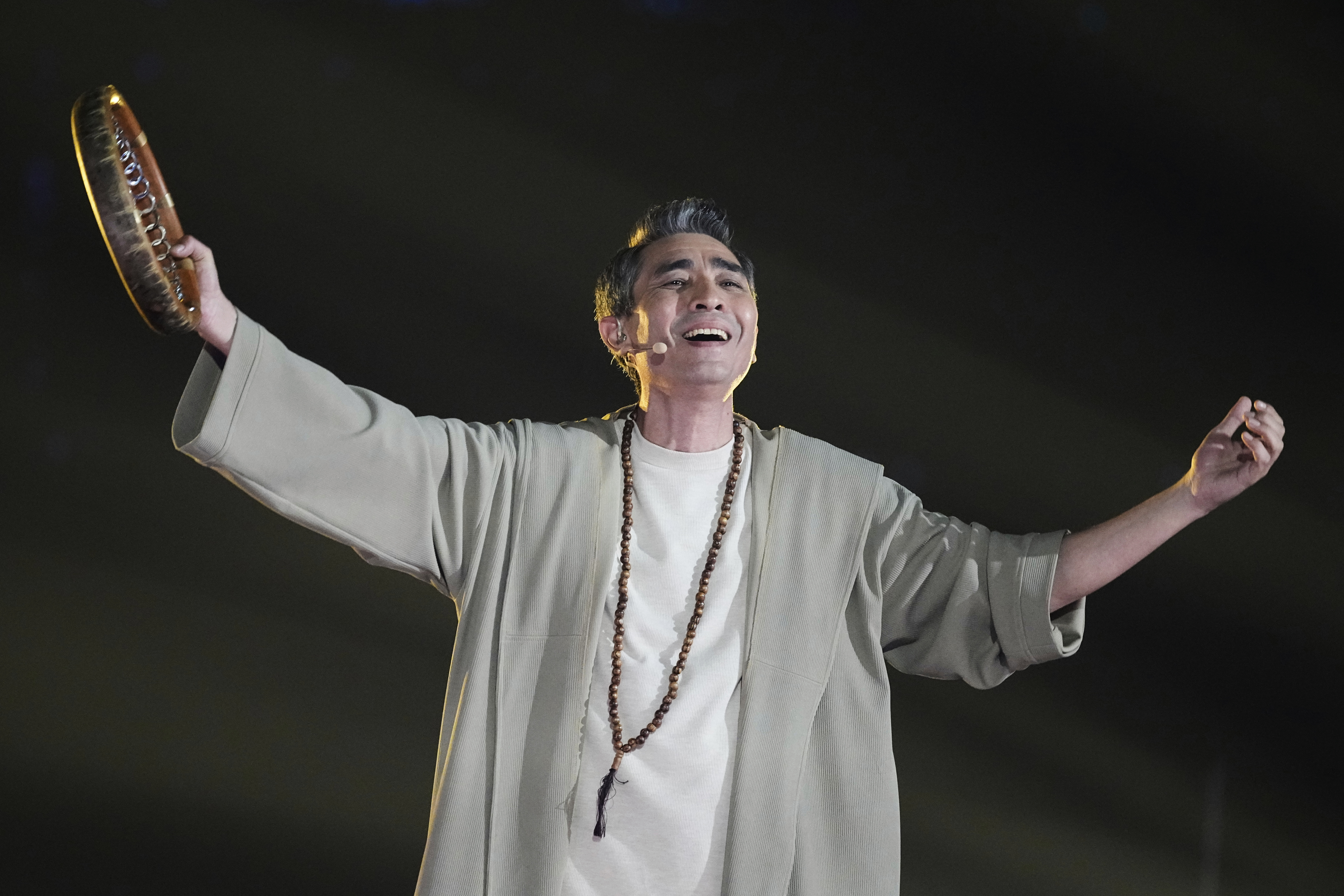 Uzbekistan's Shohruh Mirzo Ganiyev performs the song 