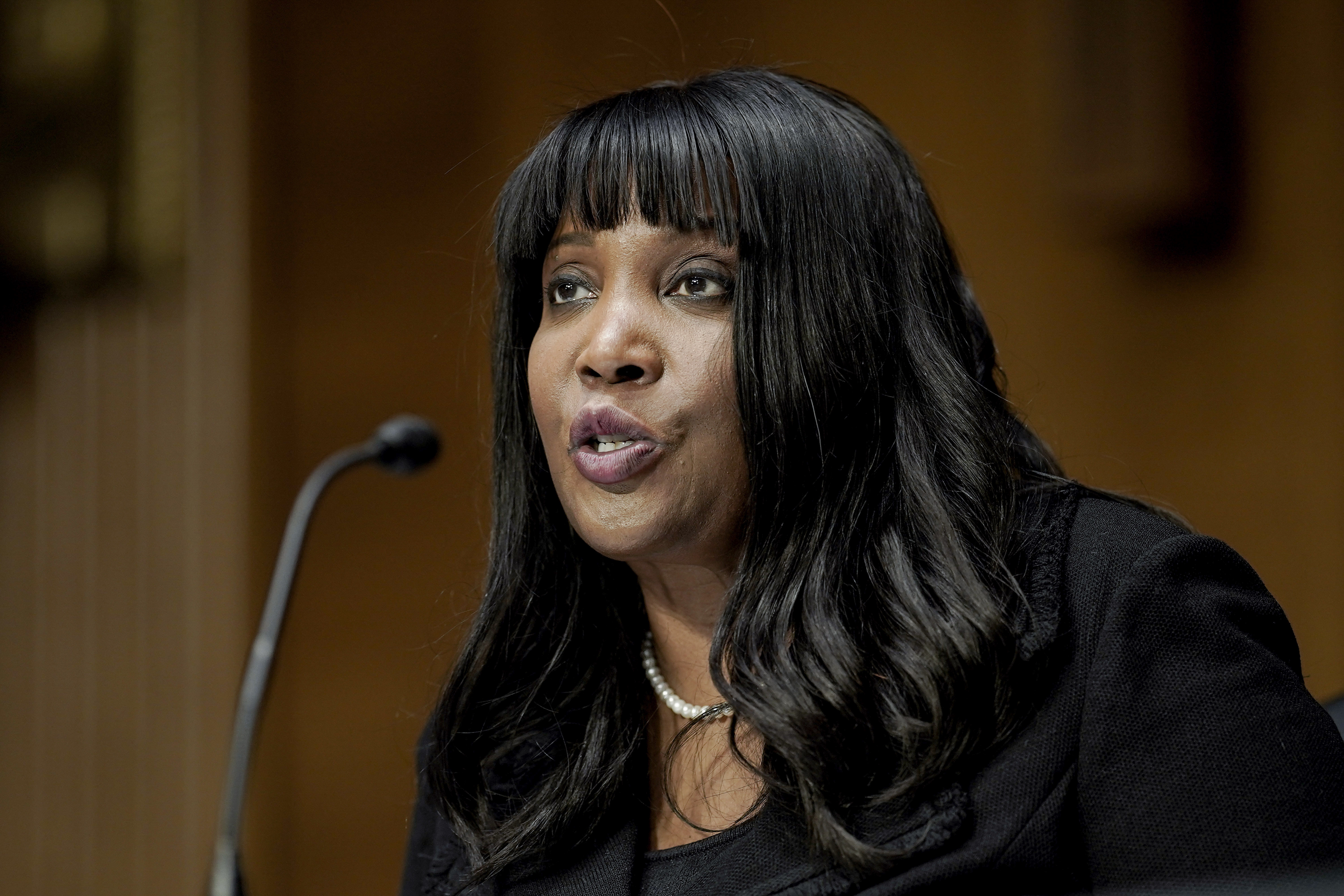 FILE - Lisa Cook, nominee to be a member of the Federal Reserve Board of Governors, speaks during the Senate Banking, Housing and Urban Affairs Committee confirmation hearing on Feb. 3, 2022, in Washington. (Ken Cedeno - Pool Reuters)