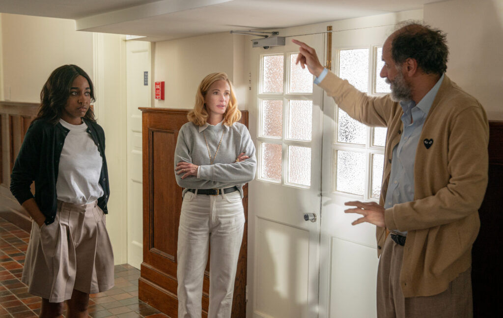 From left: Actors Ayo Edebiri and Julia Roberts with director Luca Guadagnino on the set of 'After the Hunt.' YANNIS DRAKOULIDIS/AMAZON MGM STUDIOS