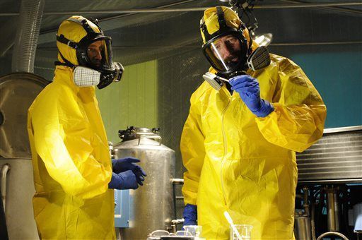 Jesse Pinkman, played by Aaron Paul, left, and Walter White, played by Bryan Cranston, cooking meth in a home being fumigated in the fifth season of 'Breaking Bad.' URSULA COYOTE/AMC