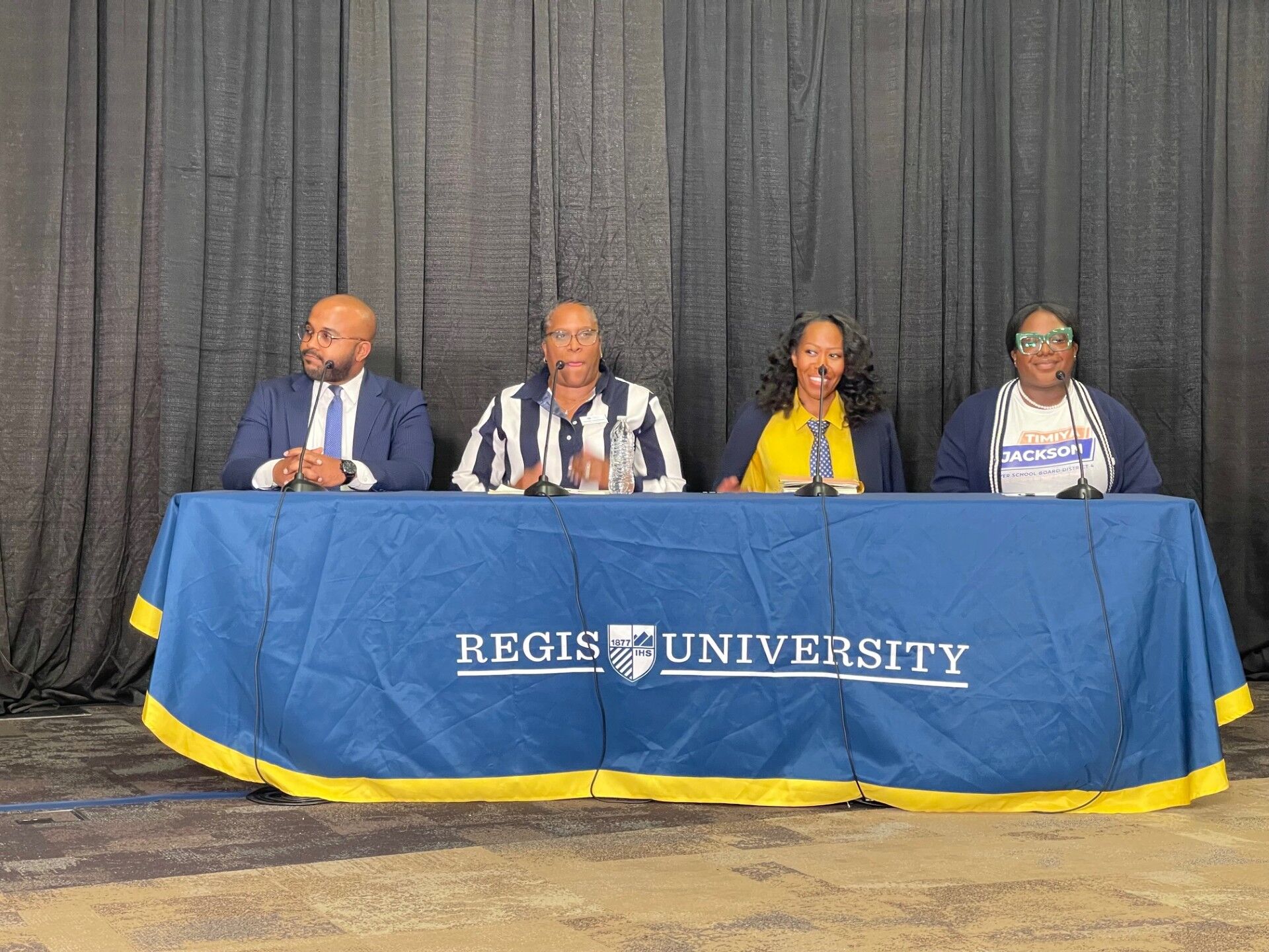 DPS board candidates spar over trust and transparency at forum