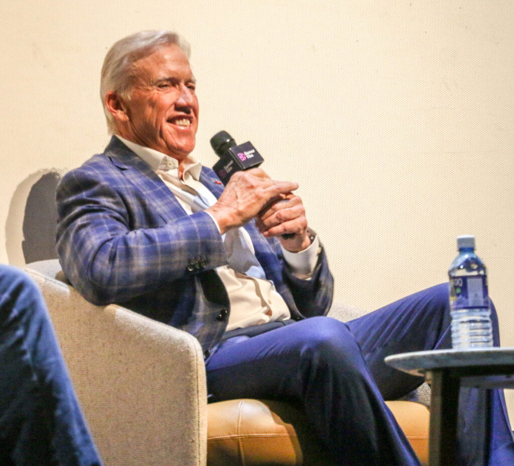 John Elway speaks from the stage of the Ellie Caulkins Opera House on Nov. 8, 2025, after the Denver Film Festival's world-premiere screening of the new Netflix documentary 'Elway.' (John Moore, The Denver Gazette)
