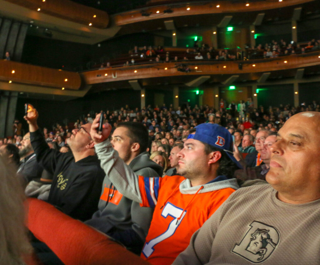 A look at the capped crowd of 1,500 Broncos fans who attended the Denver Film Festival's world-premiere screening of the new Netflix documentary 'Elway' at the Ellie Caulkins Opera House in Denver, Colo. Nov. 8, 2025. (John Moore, The Denver Gazette)